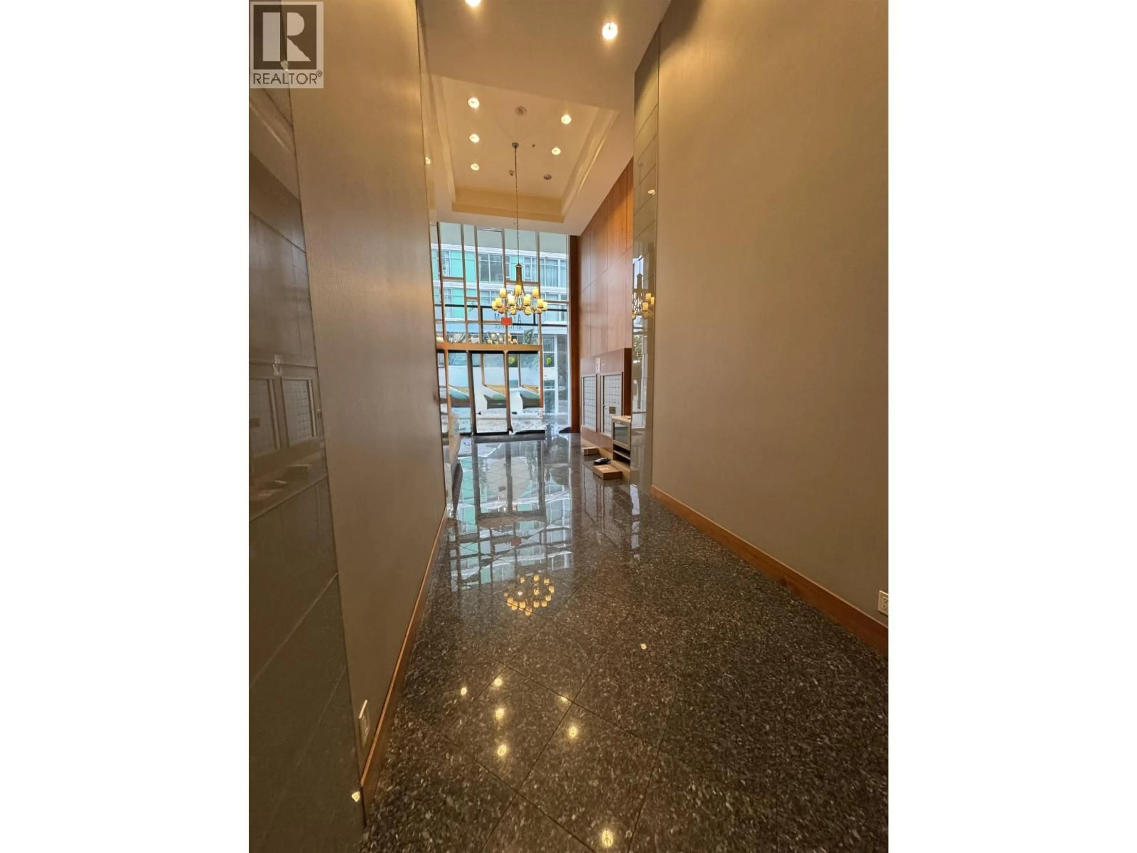 Indoor foyer for 604 - 162 VICTORY SHIP WAY, North Vancouver British Columbia V7L0B4
