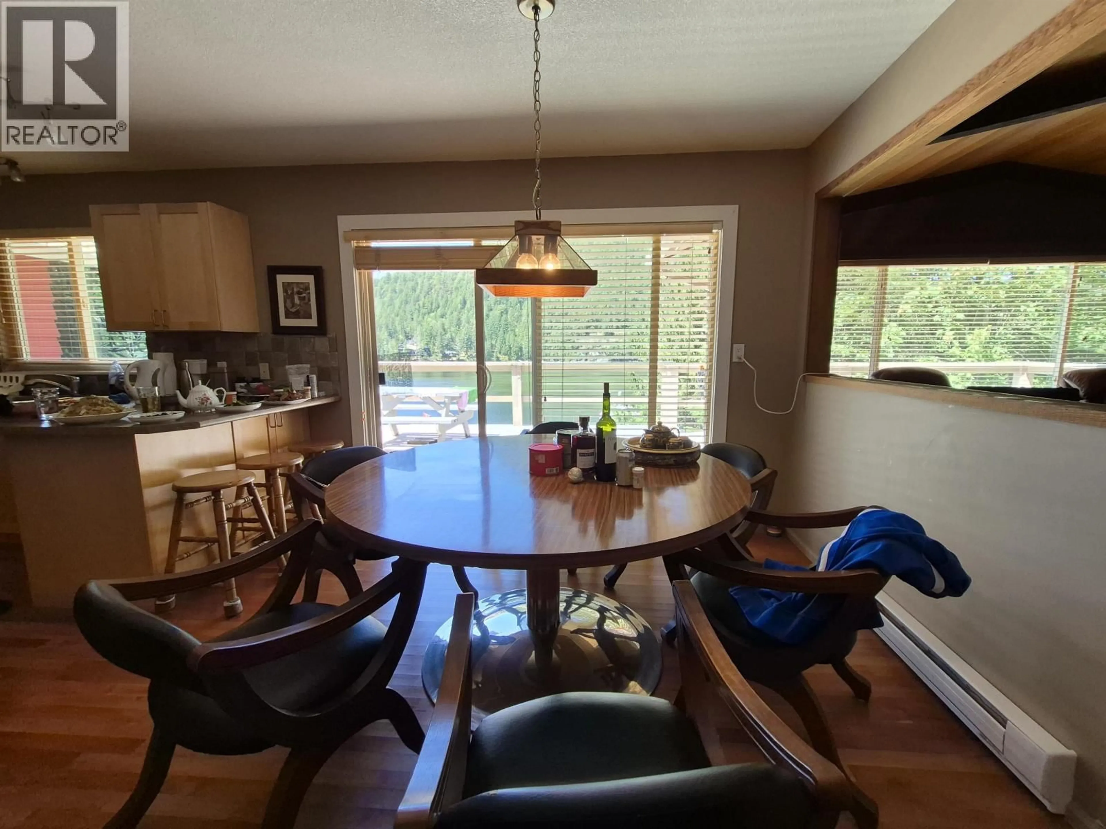 Dining room, wood/laminate floor for 13175 PORTERS ROAD, Pender Harbour British Columbia V0N2H1