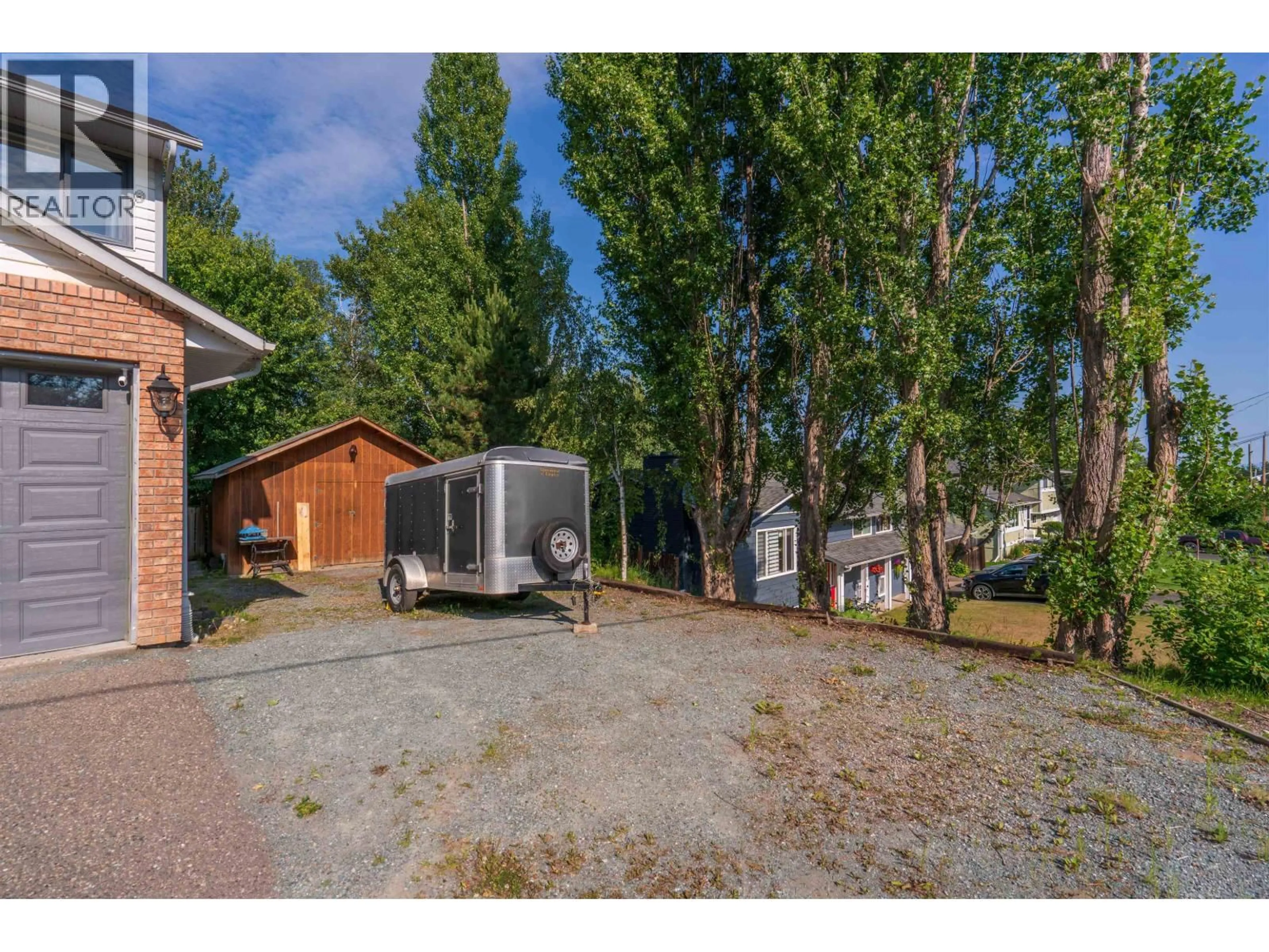 A pic from outside/outdoor area/front of a property/back of a property/a pic from drone, street for 3182 WALLACE CRESCENT, Prince George British Columbia V2K3R6