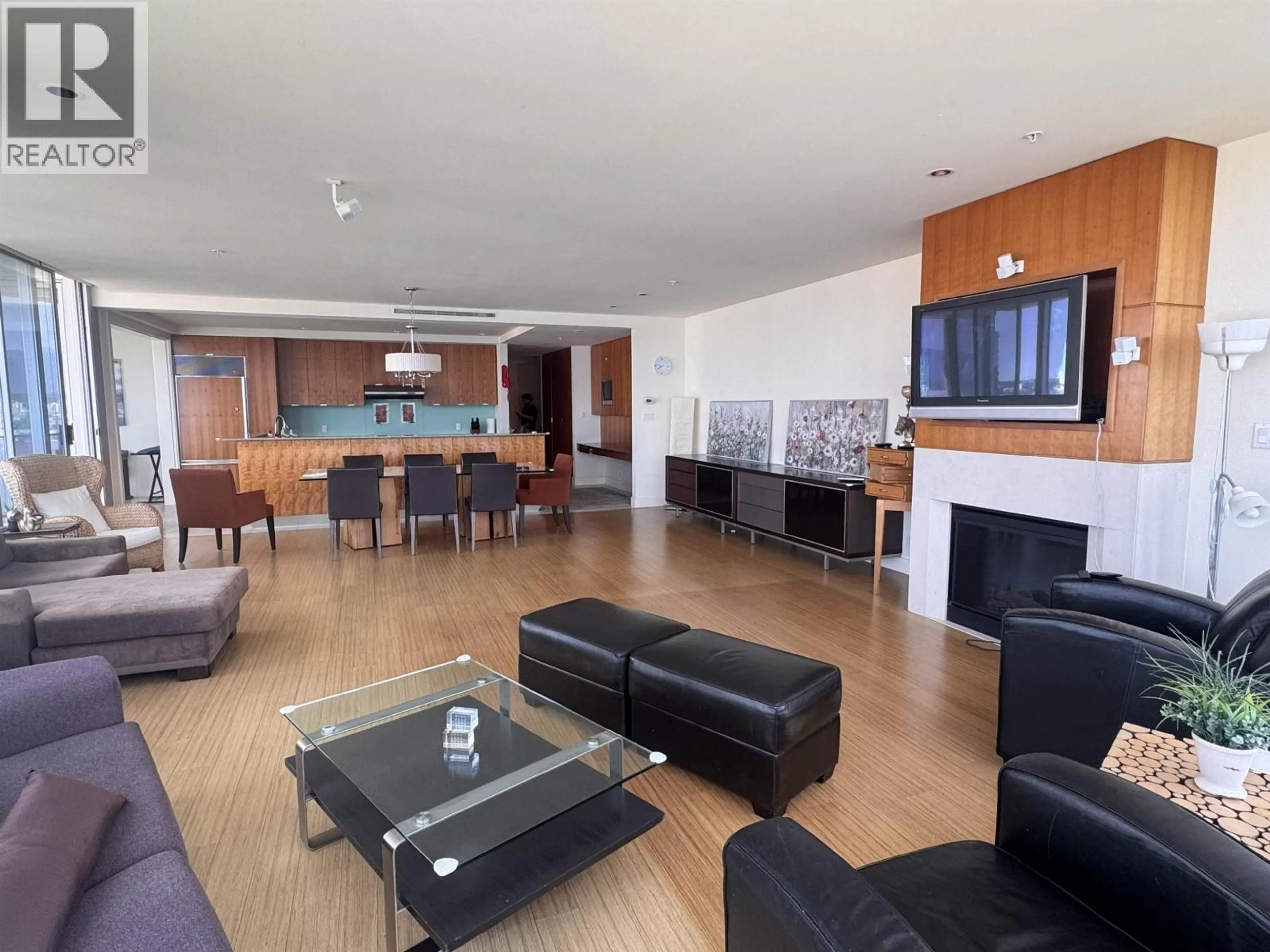 Living room with furniture, wood/laminate floor for 3101 - 1077 CORDOVA STREET, Vancouver British Columbia V6C2C6