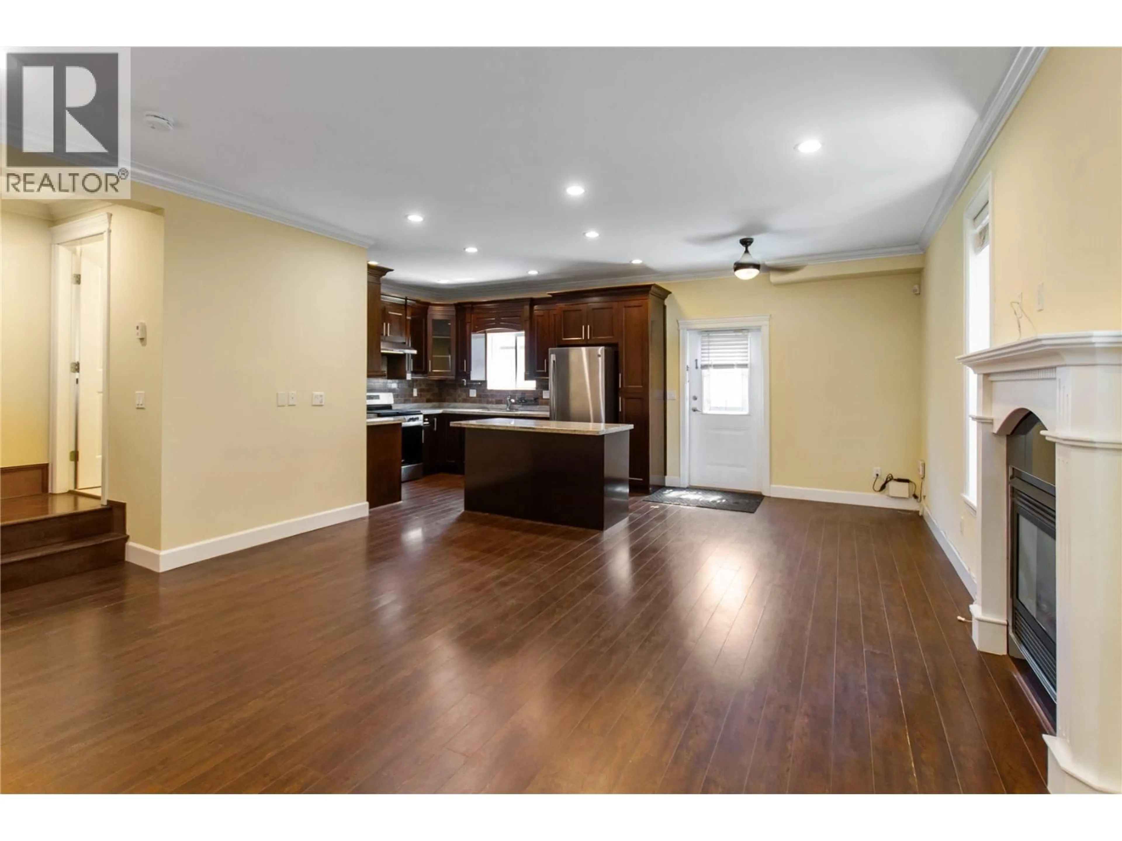 Open concept kitchen, wood/laminate floor for 7240 STRIDE AVENUE, Burnaby British Columbia V3N1T9