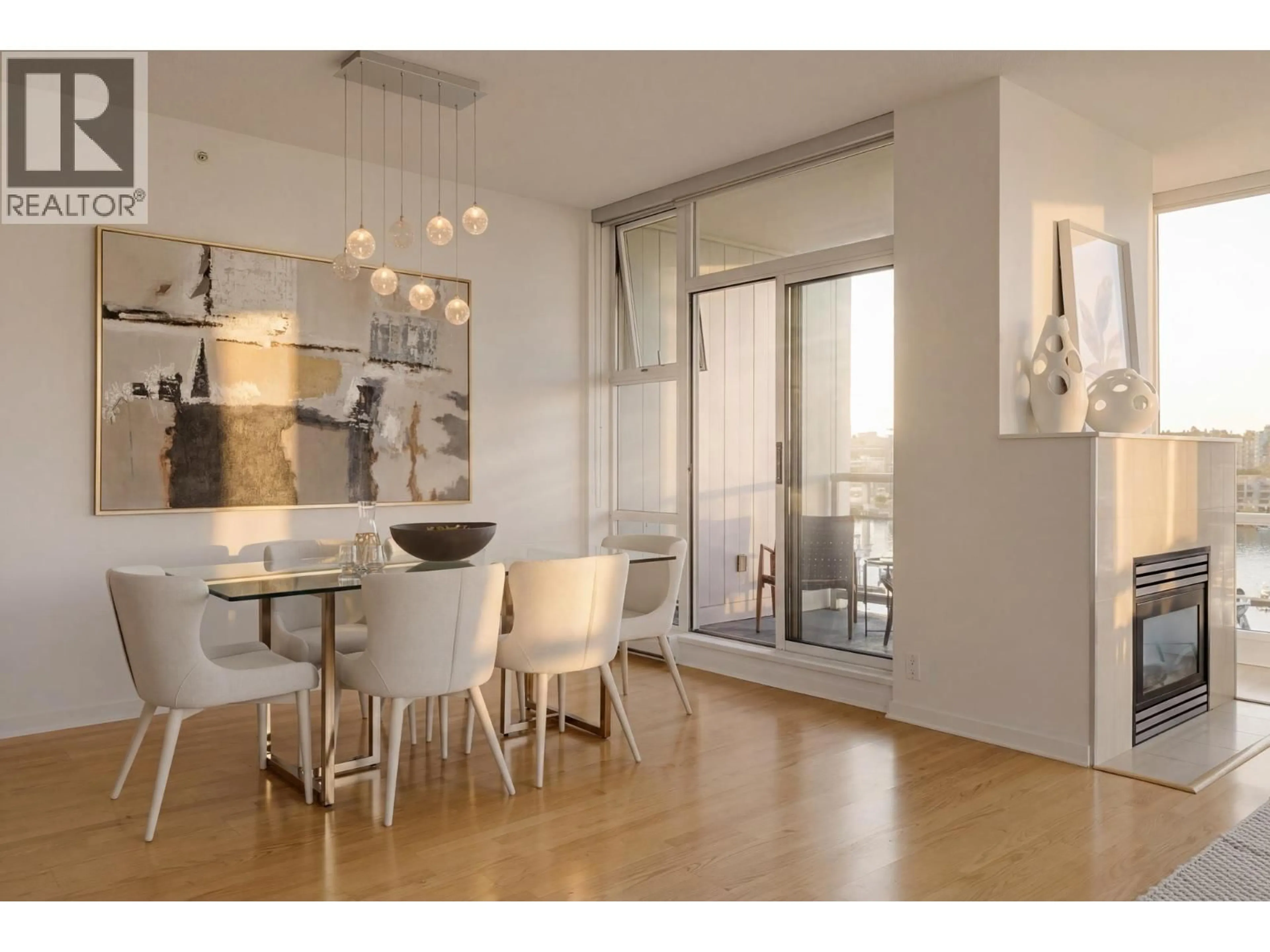Dining room, wood/laminate floor for 702 - 1099 MARINASIDE CRESCENT, Vancouver British Columbia V6Z2Z3