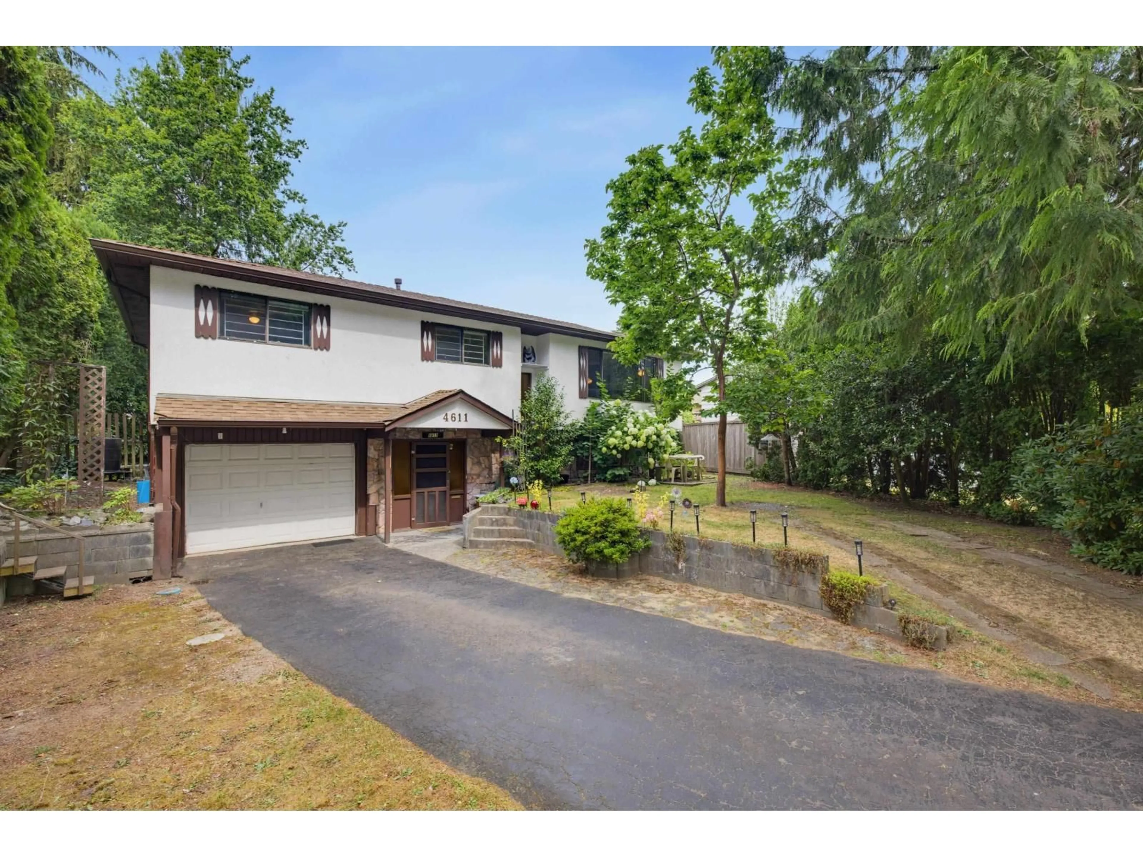 A pic from outside/outdoor area/front of a property/back of a property/a pic from drone, street for 4611 203A STREET, Langley British Columbia V3A5W2