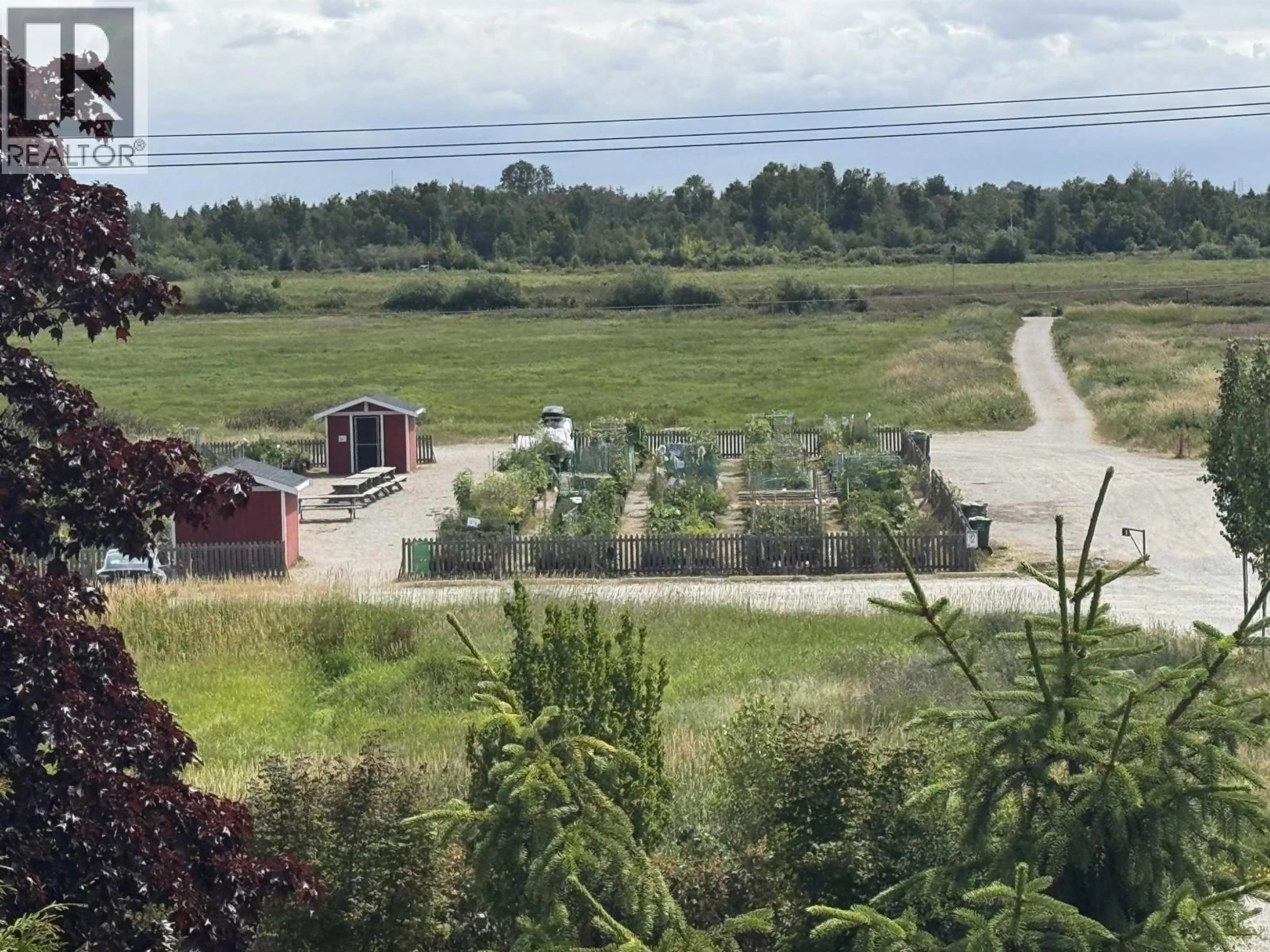 A pic from outside/outdoor area/front of a property/back of a property/a pic from drone, unknown for 311 - 5500 ARCADIA ROAD, Richmond British Columbia V6X3P5