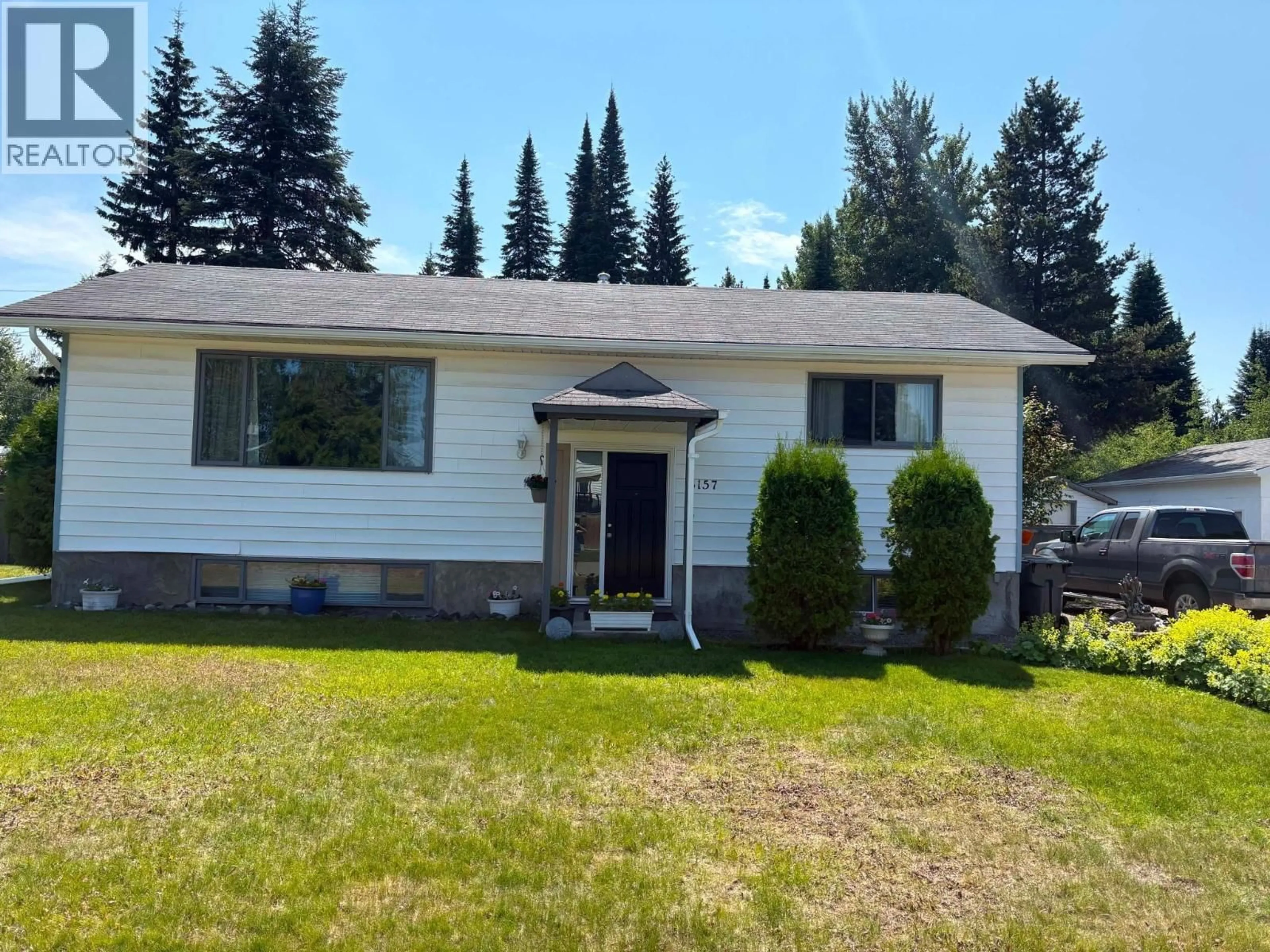 Home with vinyl exterior material, street for 8157 FLAMINGO ROAD, Prince George British Columbia V2K5H1