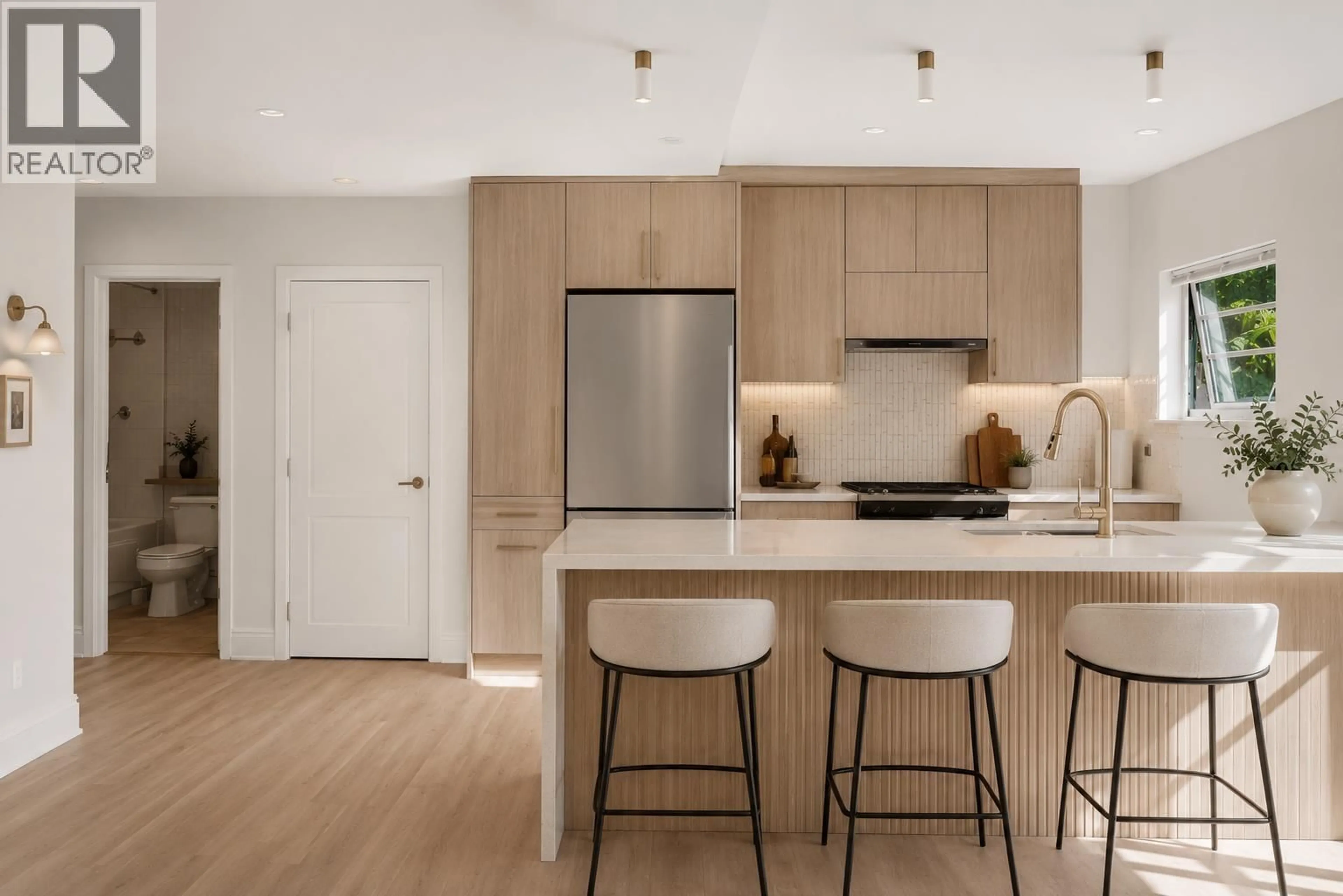 Open concept kitchen, wood/laminate floor for 3027 7TH AVENUE, Vancouver British Columbia V6K1Z7