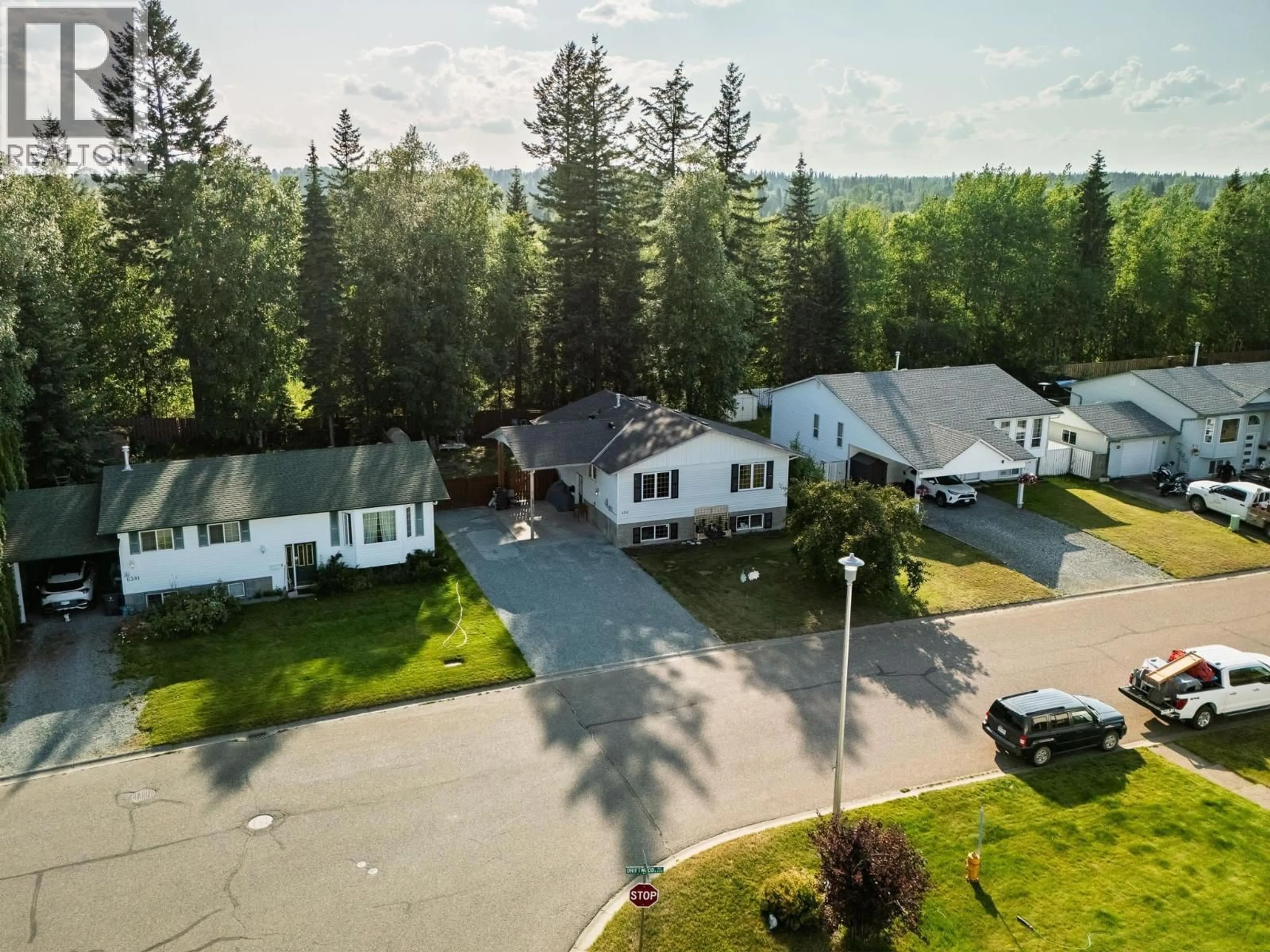 A pic from outside/outdoor area/front of a property/back of a property/a pic from drone, street for 6389 DRIFTWOOD ROAD, Prince George British Columbia V2K5B3