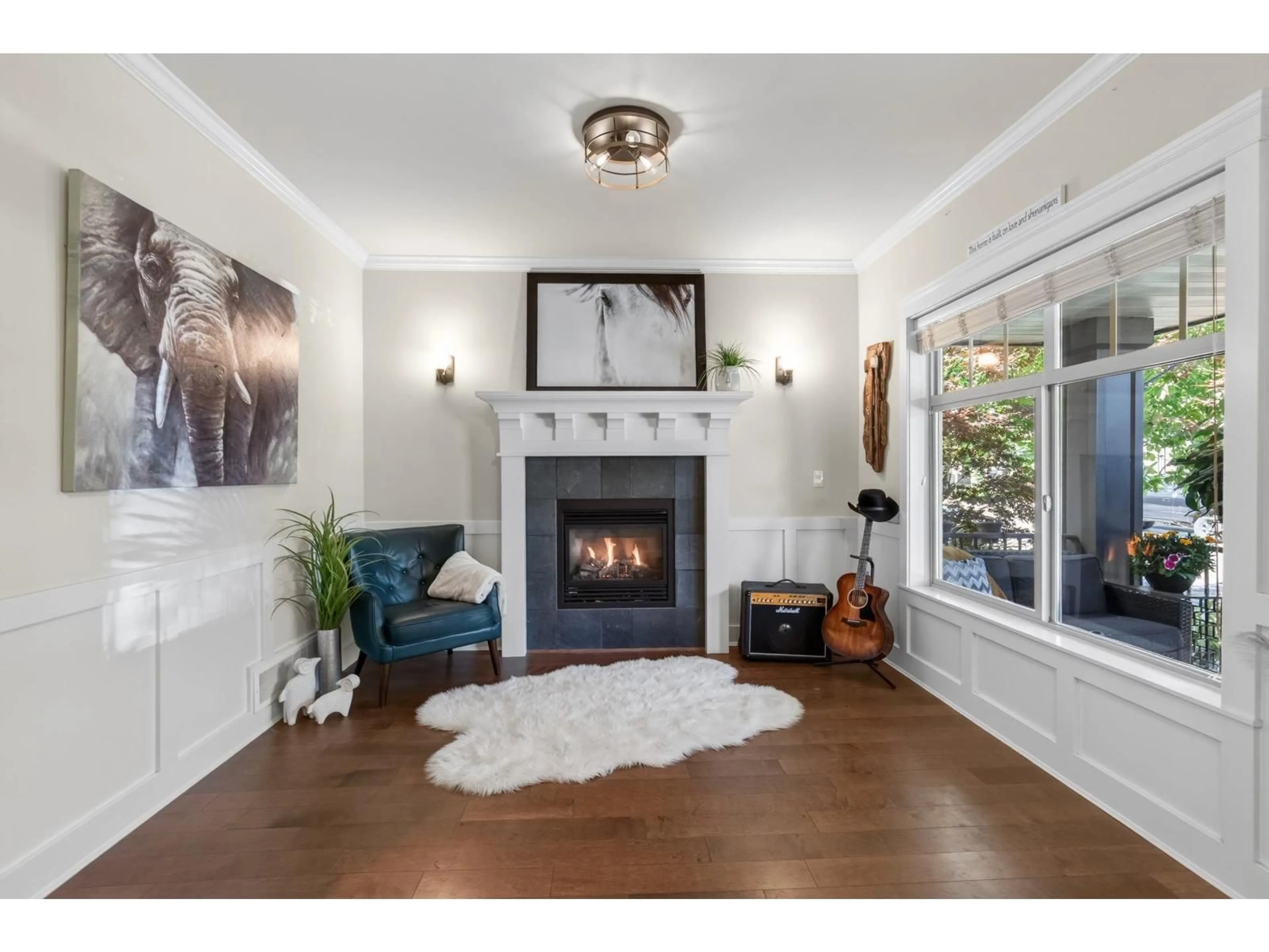Living room with furniture, wood/laminate floor for 7073 194B STREET, Surrey British Columbia V4N5Z3