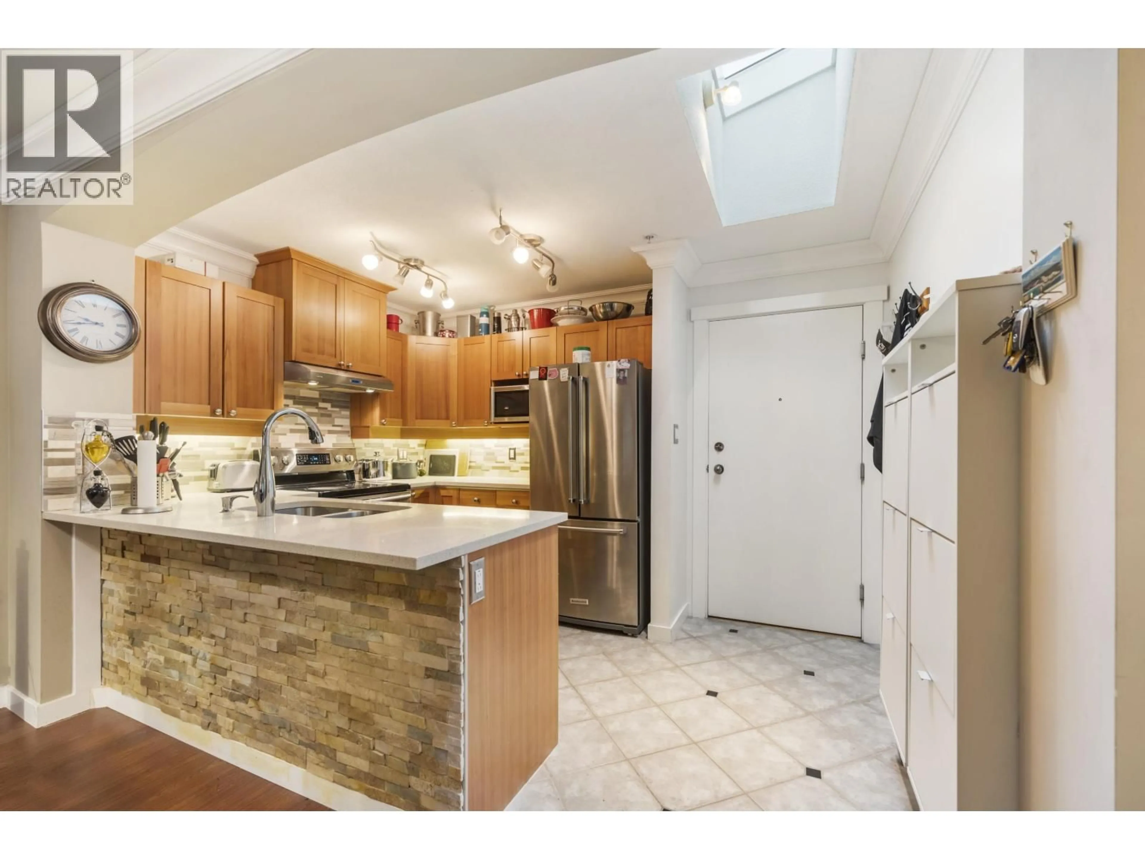 Open concept kitchen, ceramic/tile floor for 408 - 1428 PARKWAY BOULEVARD, Coquitlam British Columbia V3E3L8