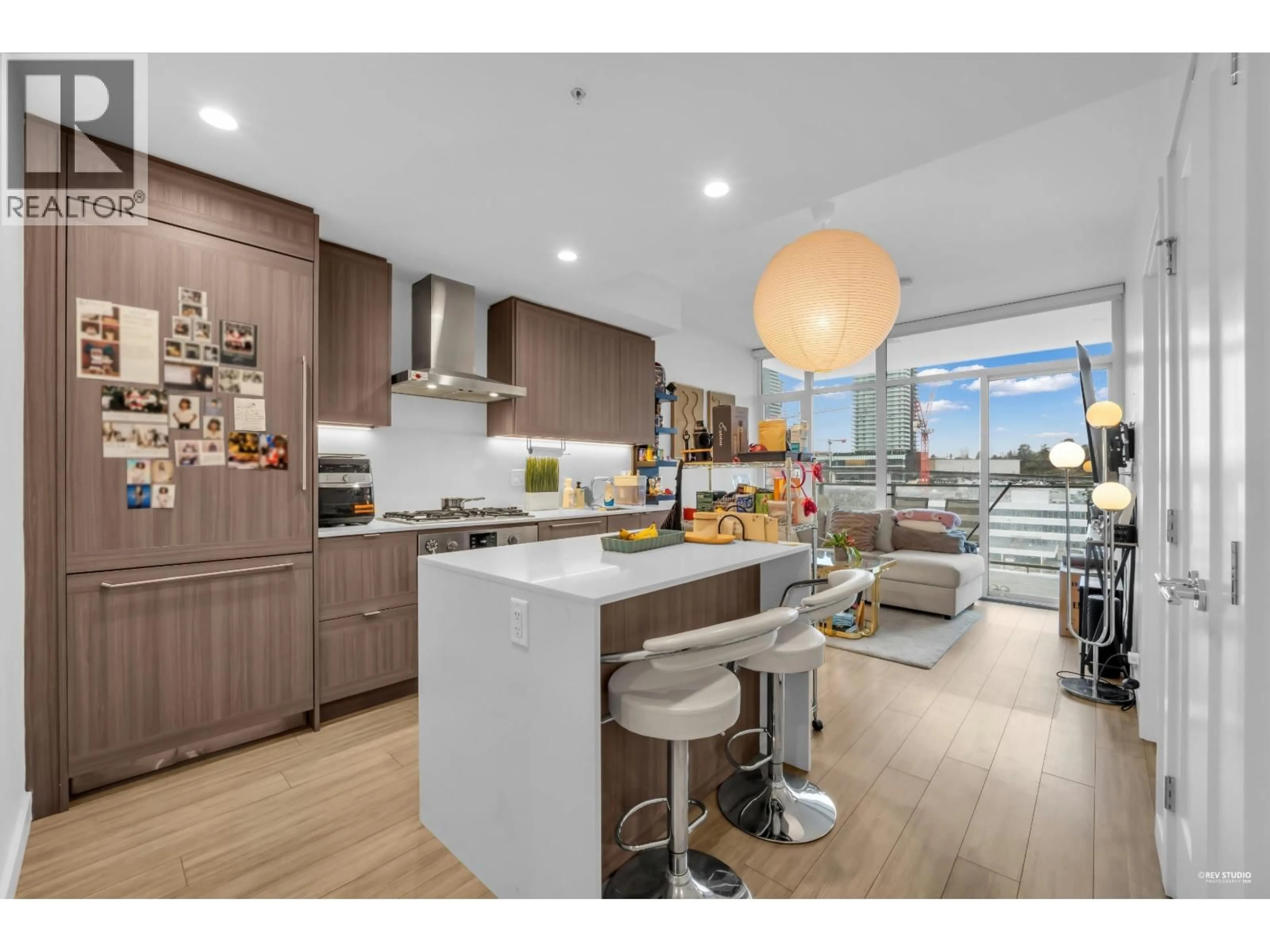 Open concept kitchen, wood/laminate floor for 1105 - 2351 BETA AVENUE, Burnaby British Columbia V5C0M2