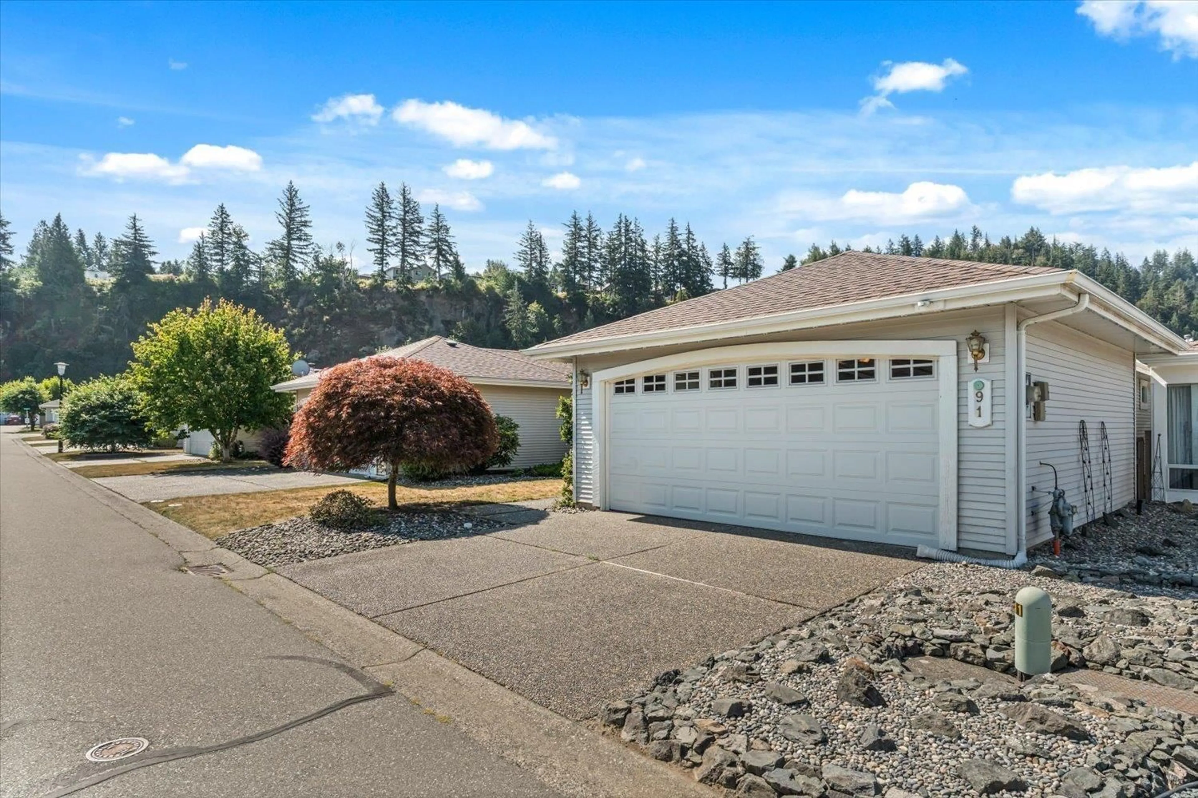 Home with vinyl exterior material, street for 91 - 6001 PROMONTORY ROAD, Chilliwack British Columbia V2R3E3