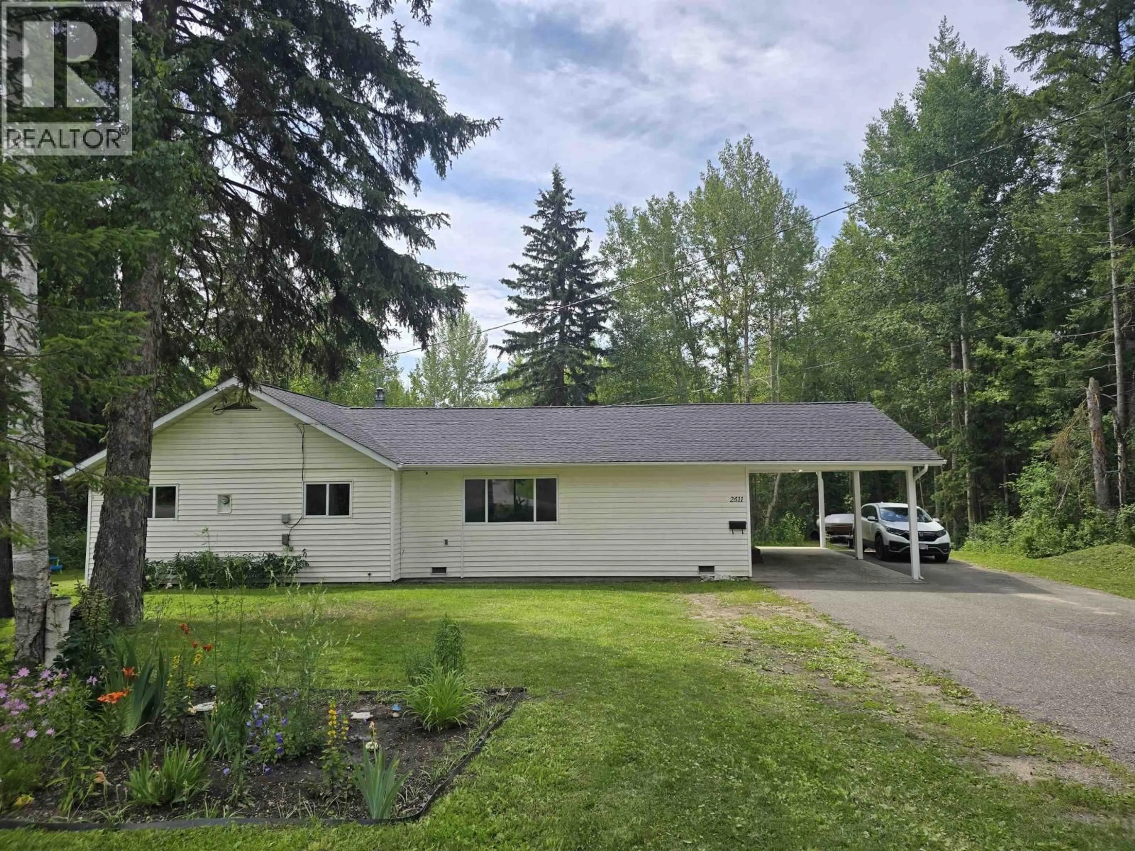 Home with vinyl exterior material, street for 2611 GOOK ROAD, Quesnel British Columbia V2J4H8