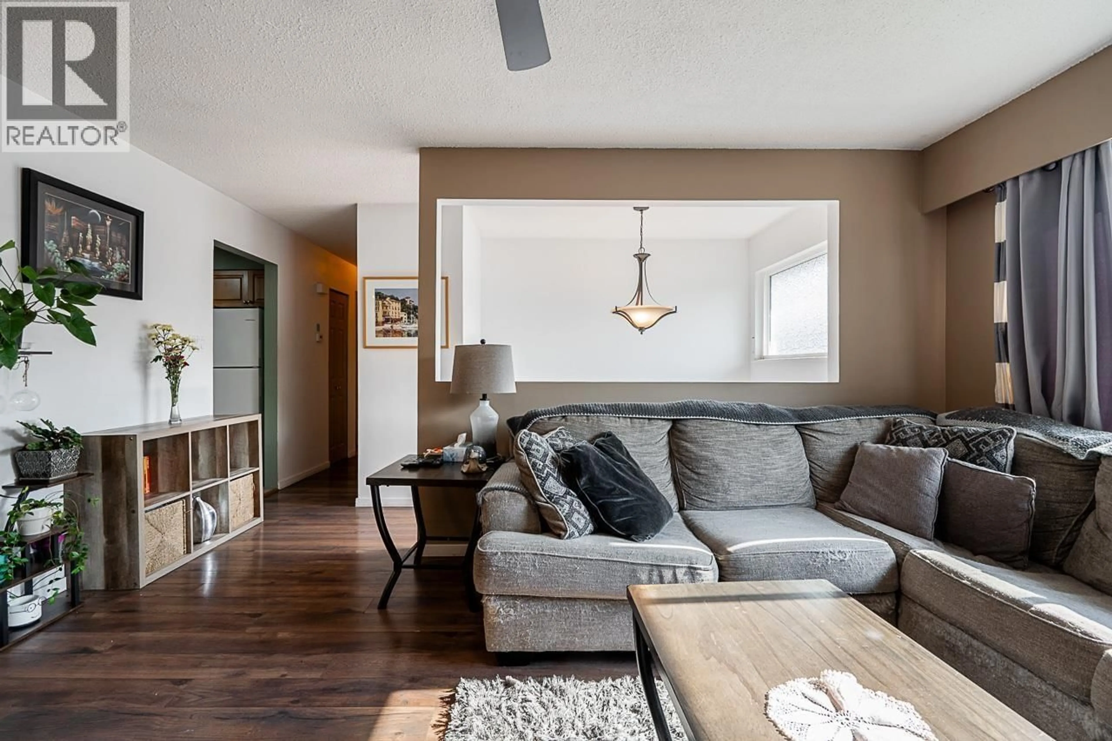 Living room with furniture, wood/laminate floor for 12130 229TH STREET, Maple Ridge British Columbia V2X7M8