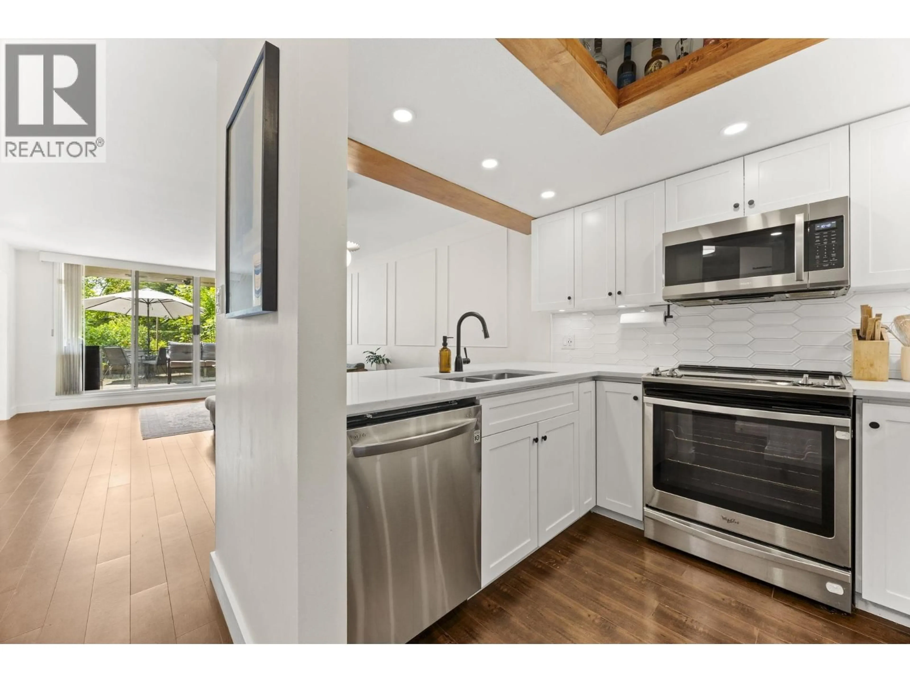 Open concept kitchen, wood/laminate floor for 102 - 1045 QUAYSIDE DRIVE, New Westminster British Columbia V3M6C9