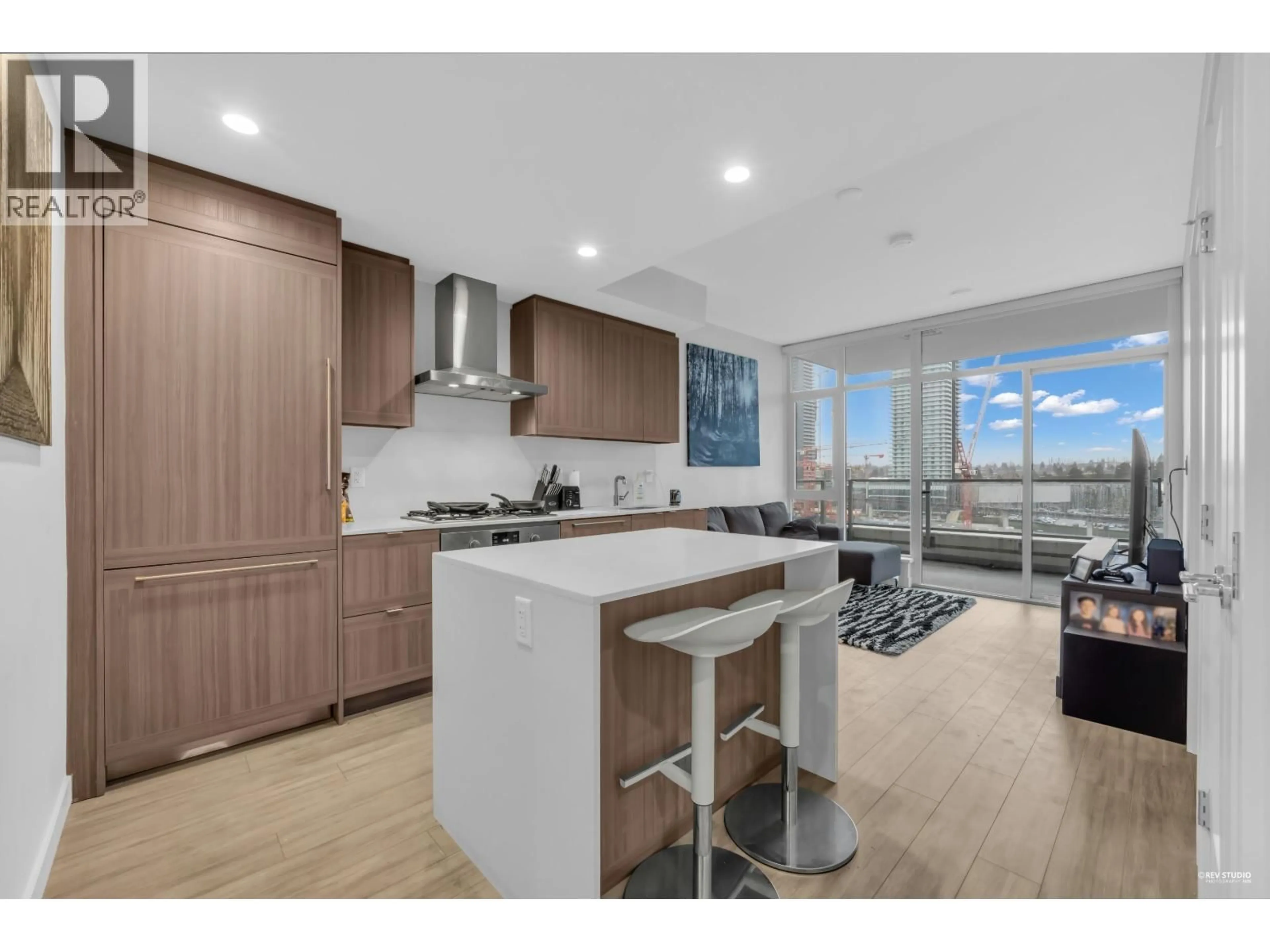 Open concept kitchen, wood/laminate floor for 1805 - 2351 BETA AVENUE, Burnaby British Columbia V5C0M2