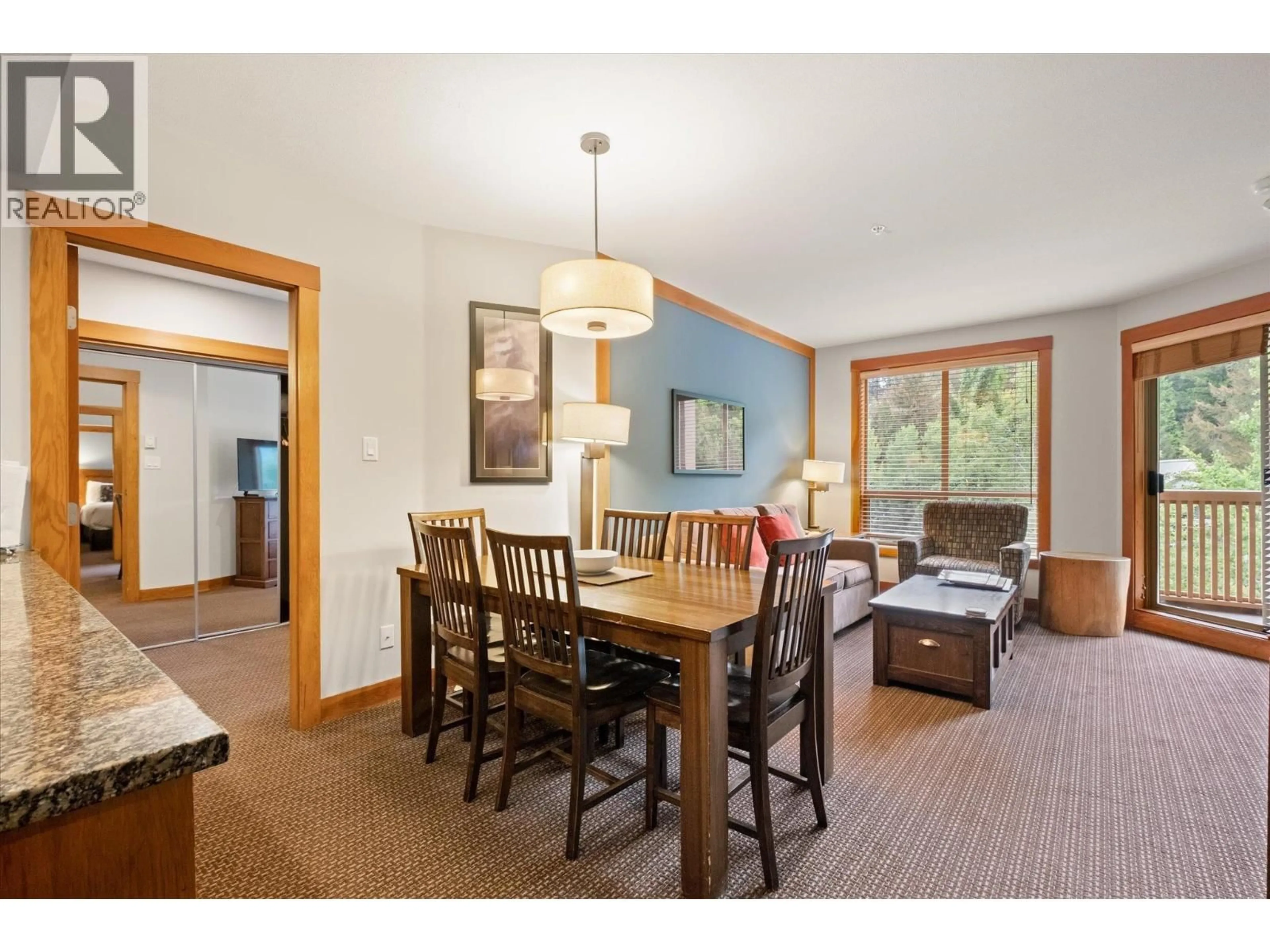 Dining room, wood/laminate floor for 422 - 2036 LONDON LANE, Whistler British Columbia V8E0N7