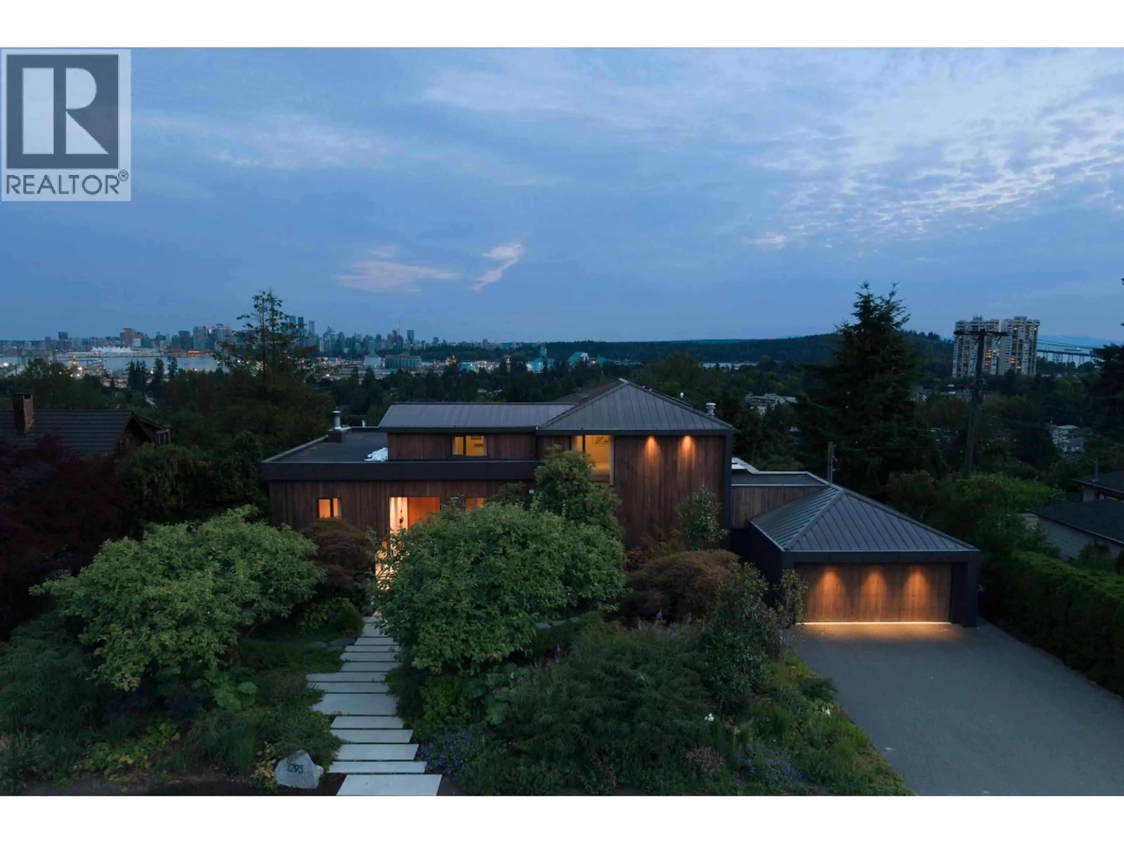 A pic from outside/outdoor area/front of a property/back of a property/a pic from drone, mountain view for 1295 KEITH ROAD, North Vancouver British Columbia V7P1Y9