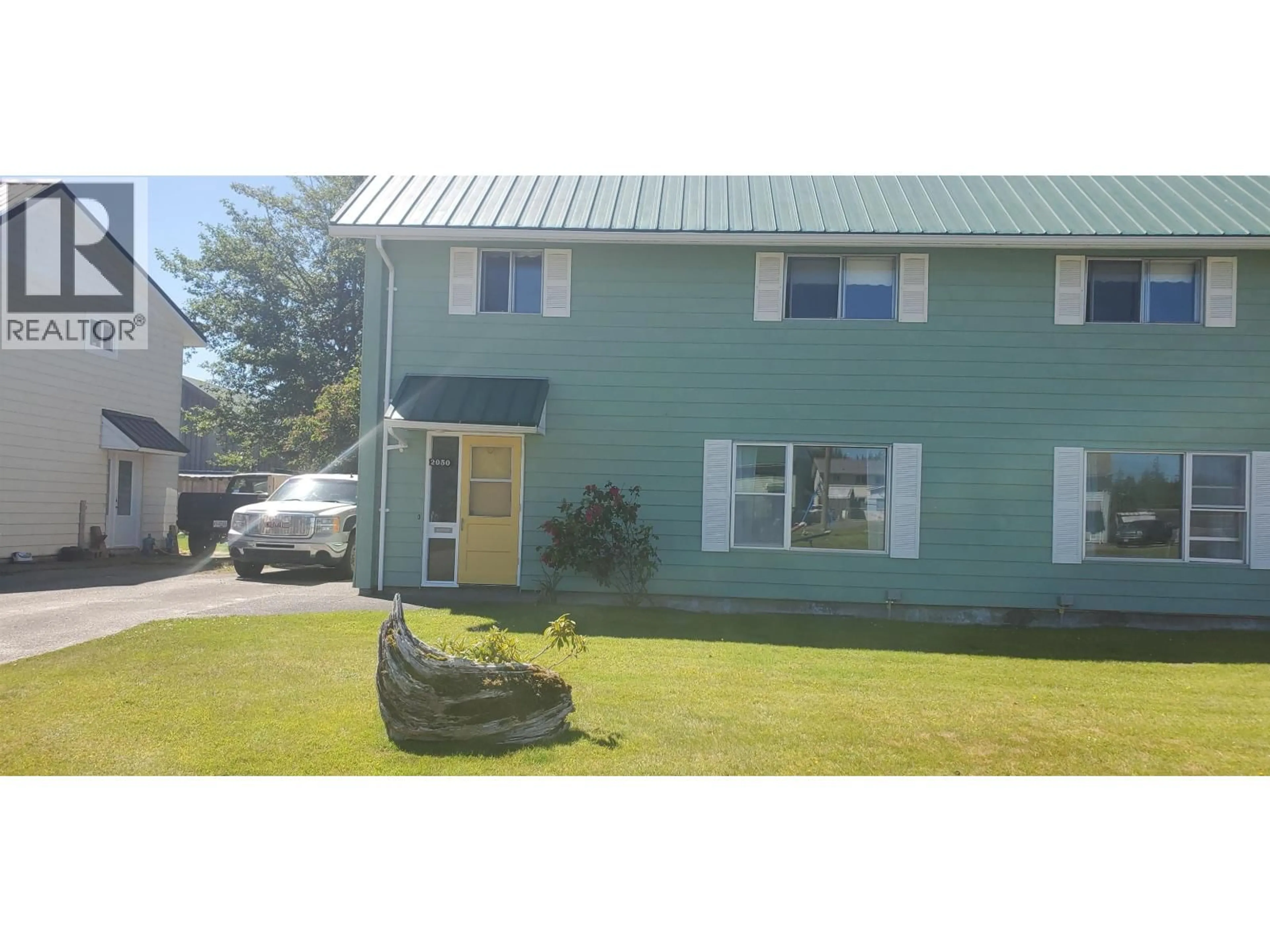 A pic from outside/outdoor area/front of a property/back of a property/a pic from drone, unknown for 2052 MAPLE CRESCENT, Masset British Columbia V0T1M0