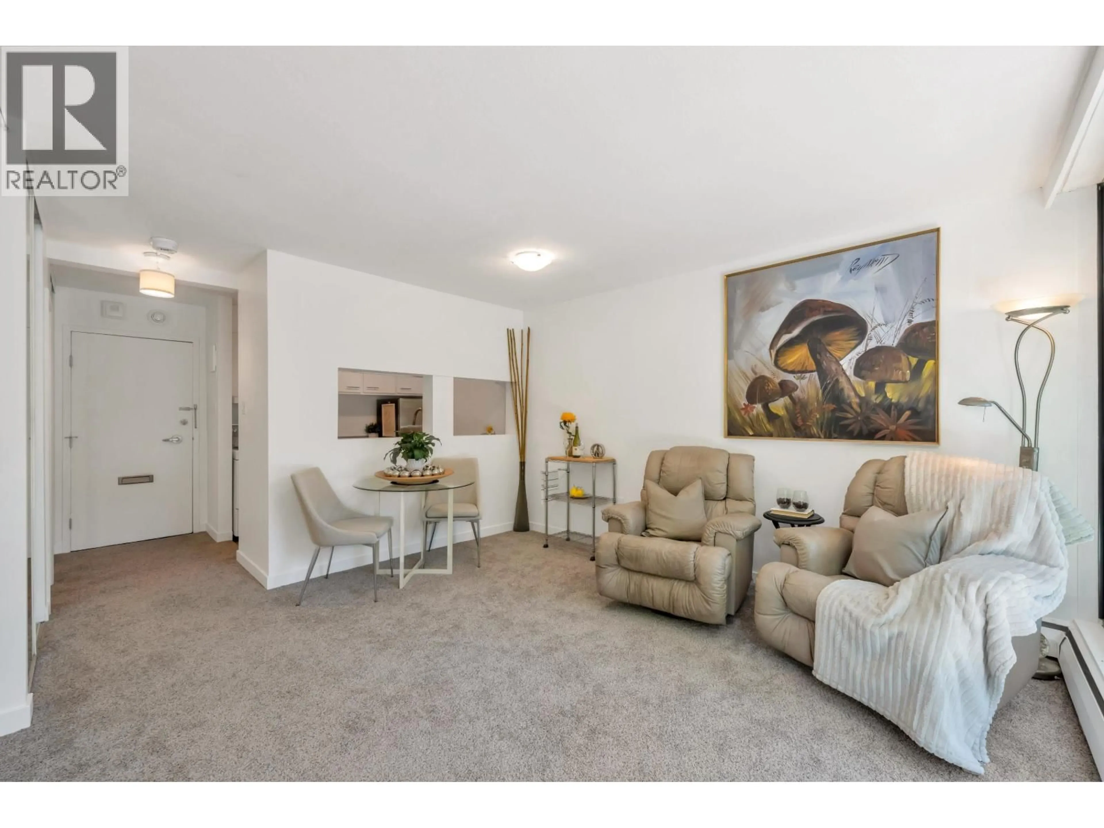 Living room with furniture, carpet floor for 203 - 1330 HARWOOD STREET, Vancouver British Columbia V6E1S8