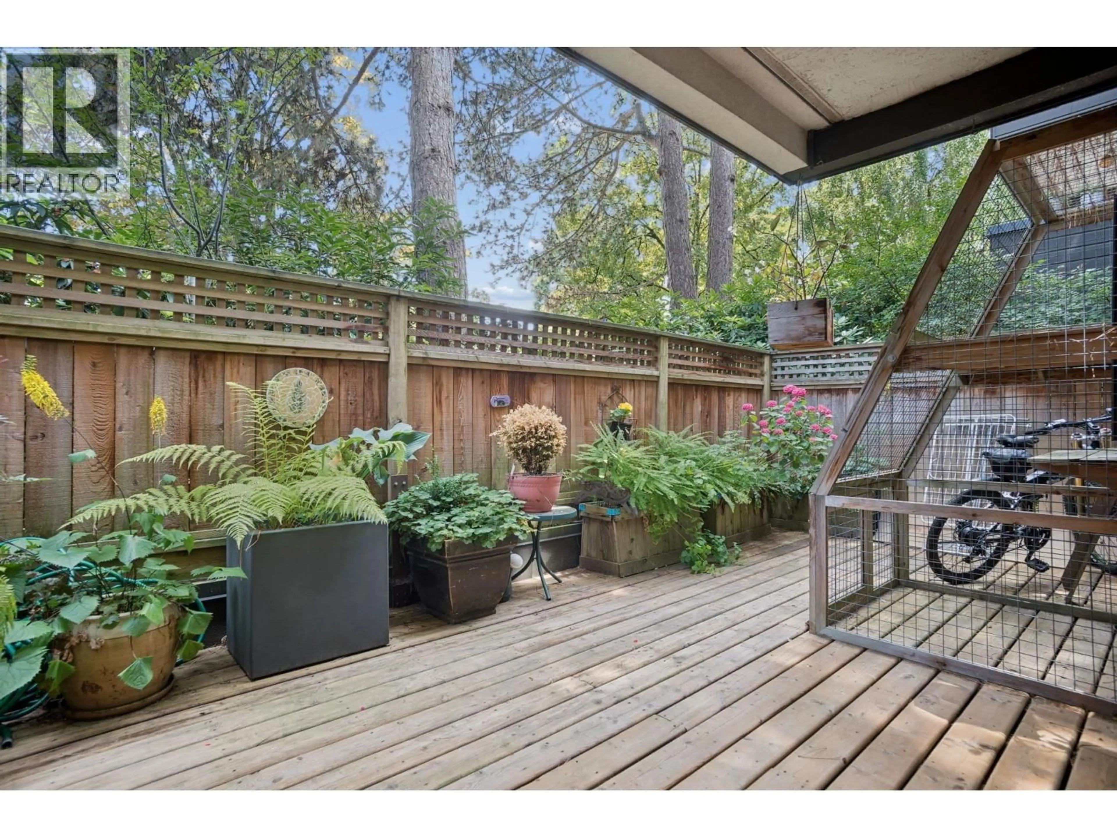 Patio, forest/trees view for 102 - 2255 8TH AVENUE, Vancouver British Columbia V6K2A6