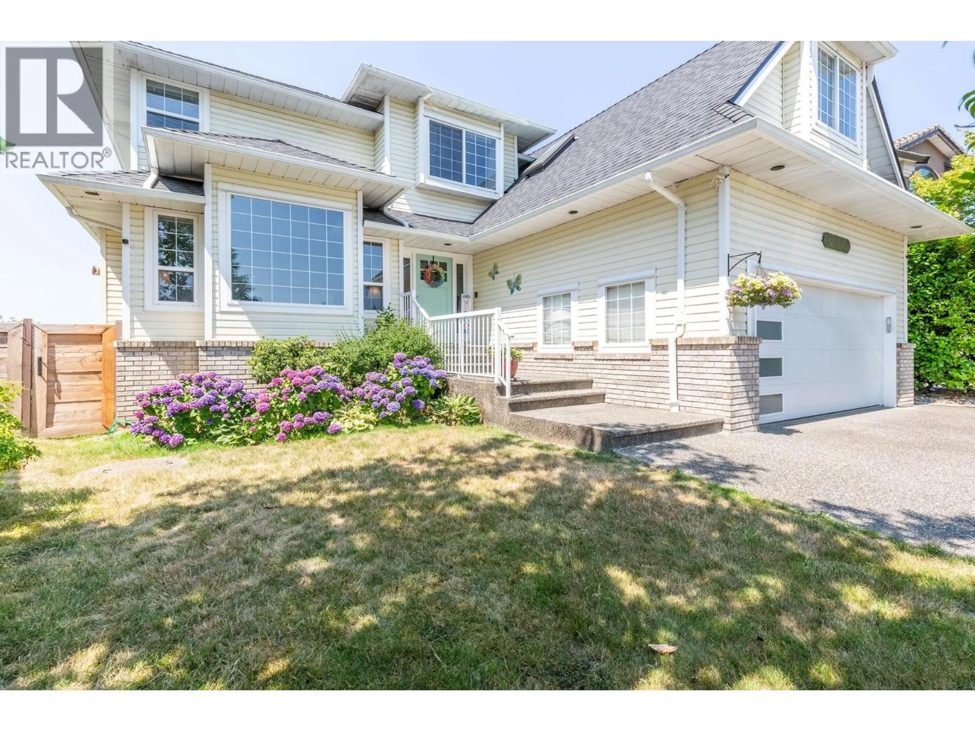 Home with vinyl exterior material, street for 18907 118B AVENUE, Pitt Meadows British Columbia V3Y2L2