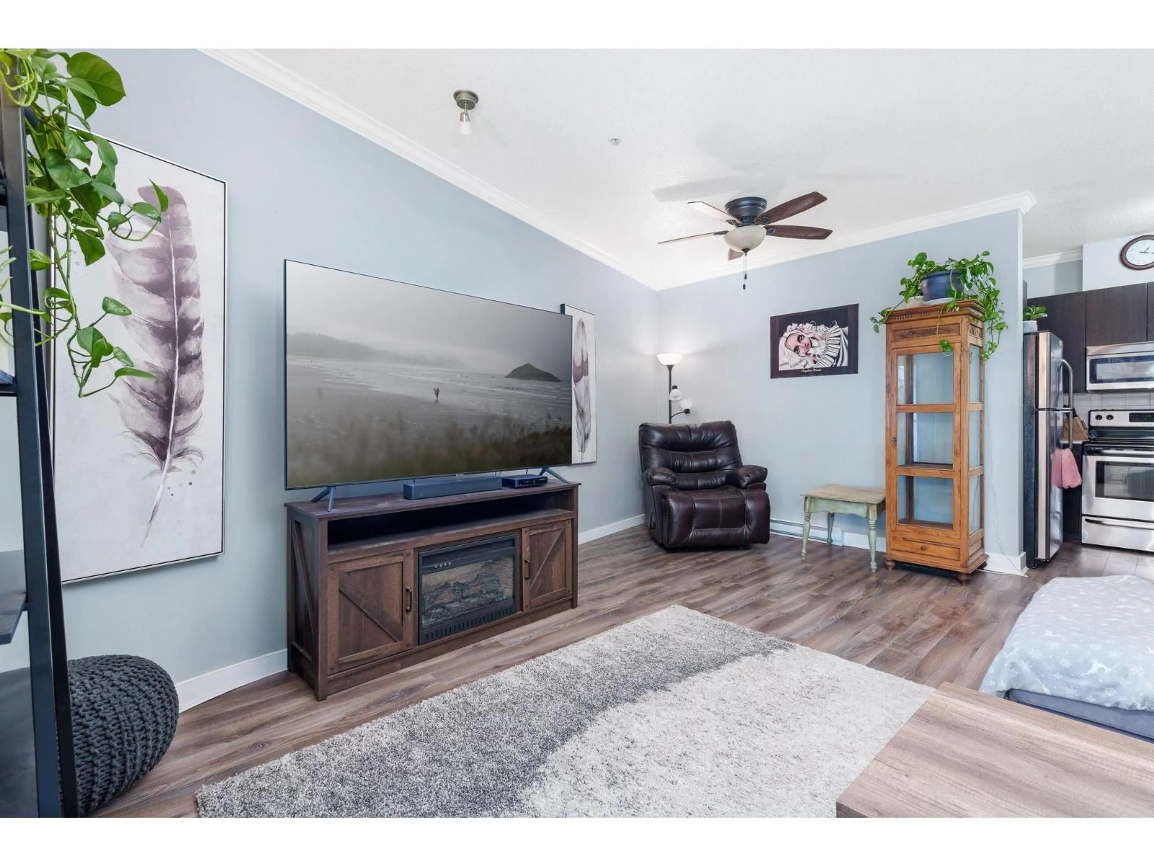Living room with furniture, wood/laminate floor for 318 - 20460 DOUGLAS CRESCENT, Langley British Columbia V3A0C6