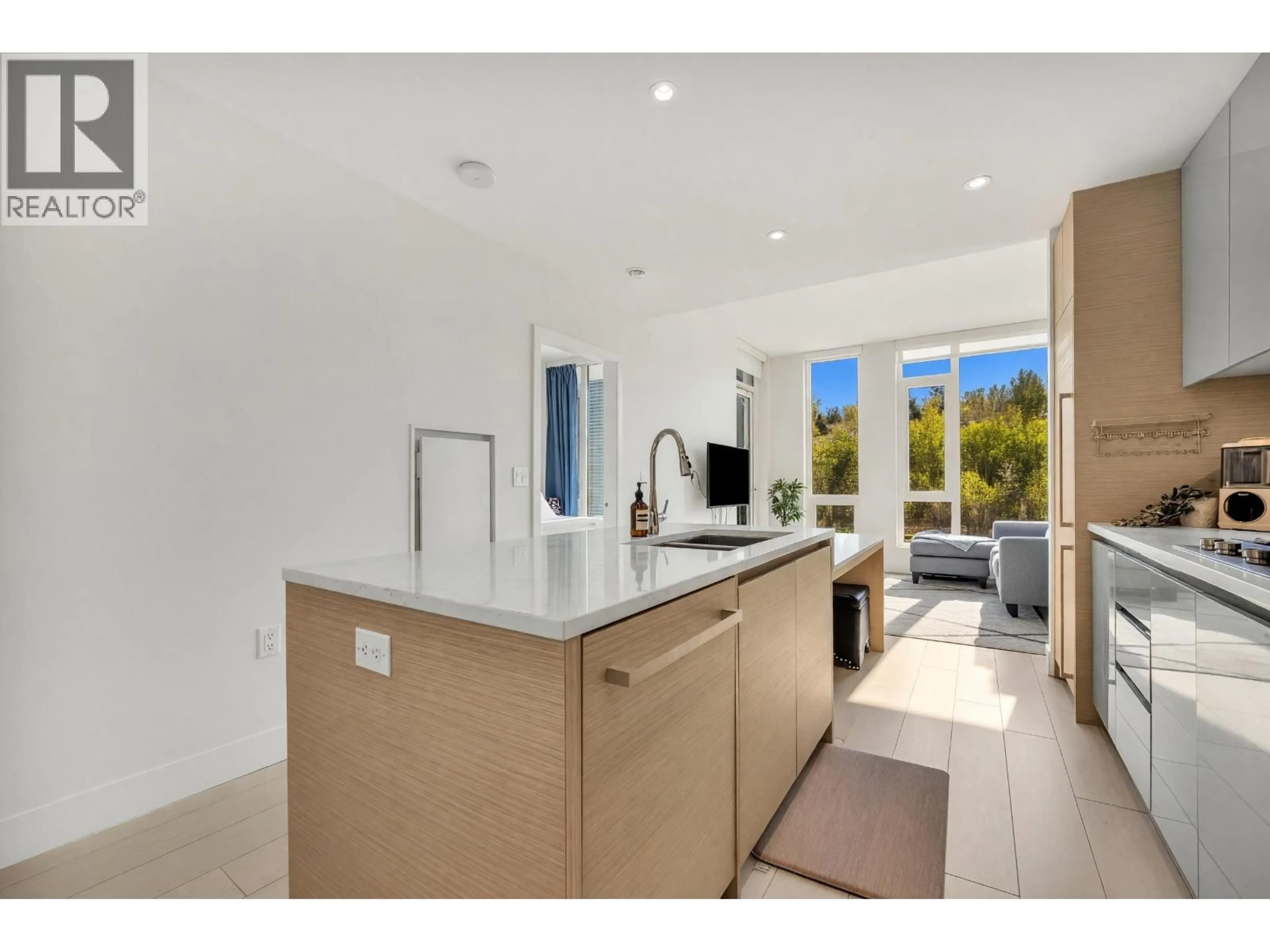 Open concept kitchen, ceramic/tile floor for 512 - 3538 SAWMILL CRESCENT, Vancouver British Columbia V5S0J8