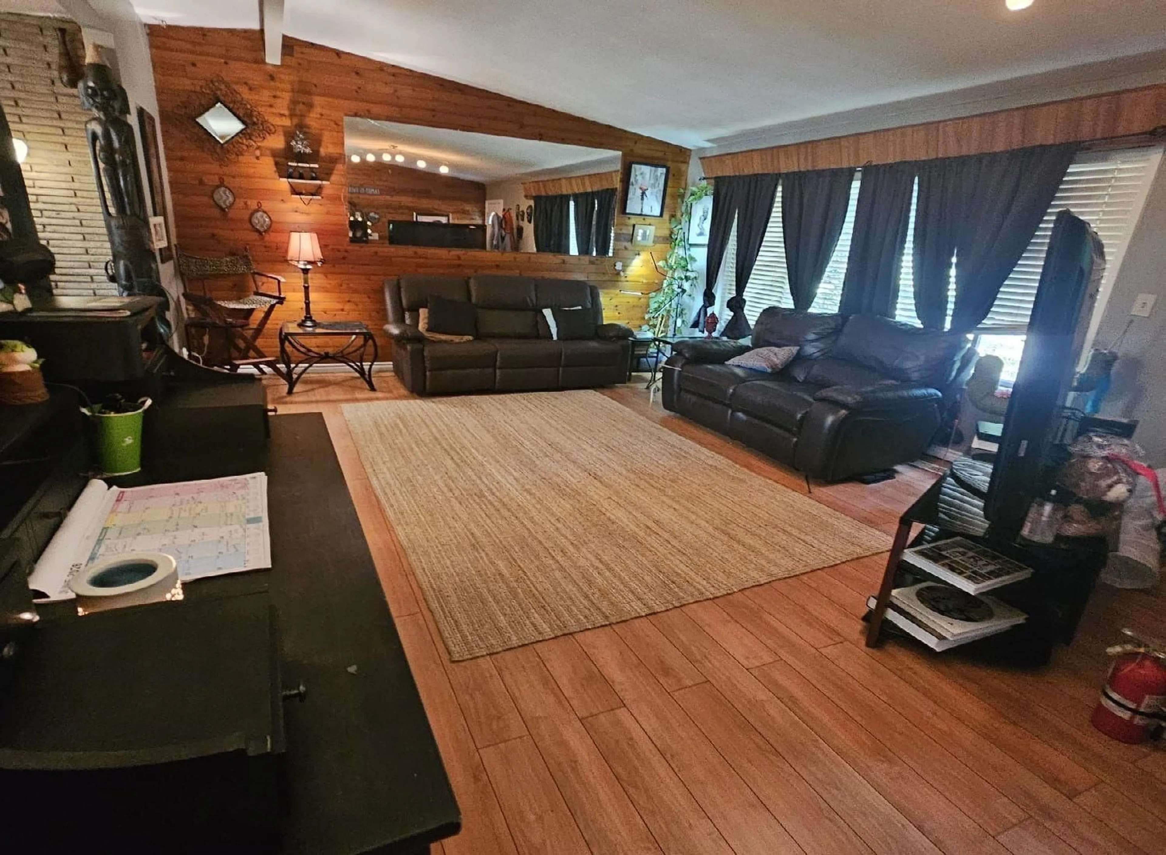Living room with furniture, wood/laminate floor for 11333 96 AVENUE, Surrey British Columbia V3V1V7