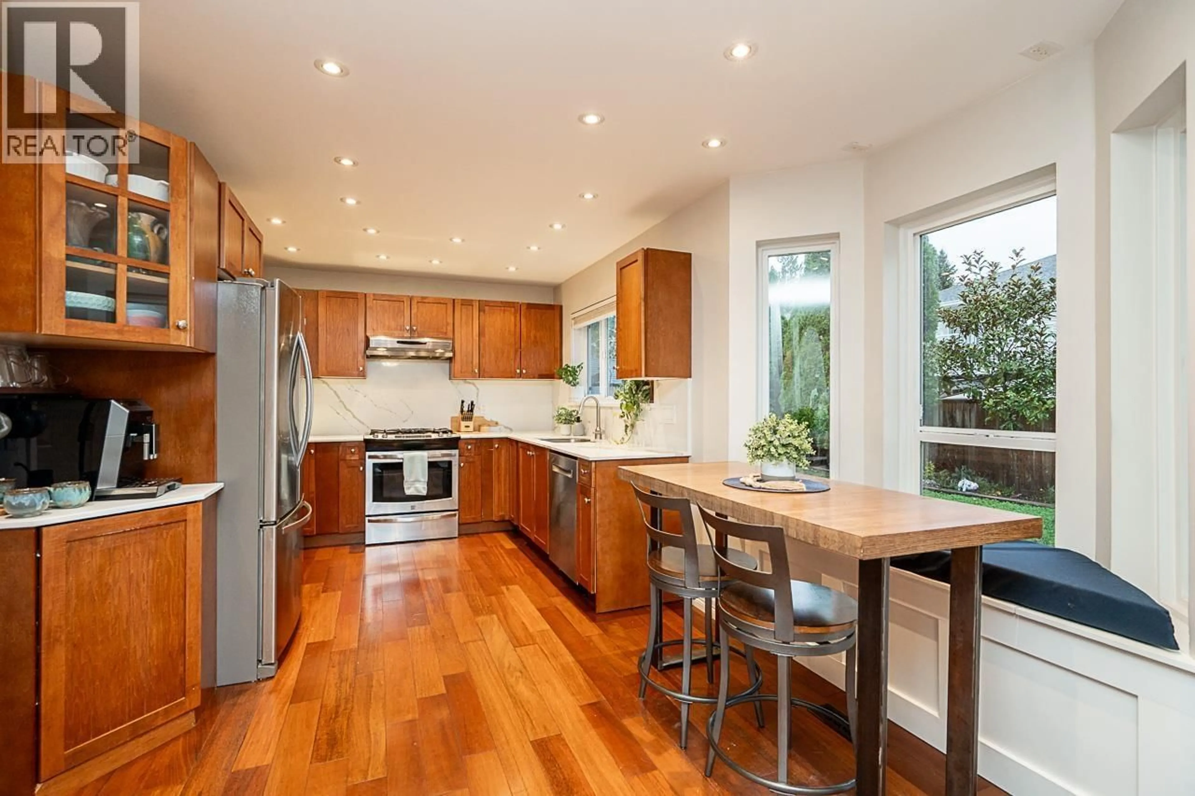 Open concept kitchen, wood/laminate floor for 20735 115 AVENUE, Maple Ridge British Columbia V2X0C8