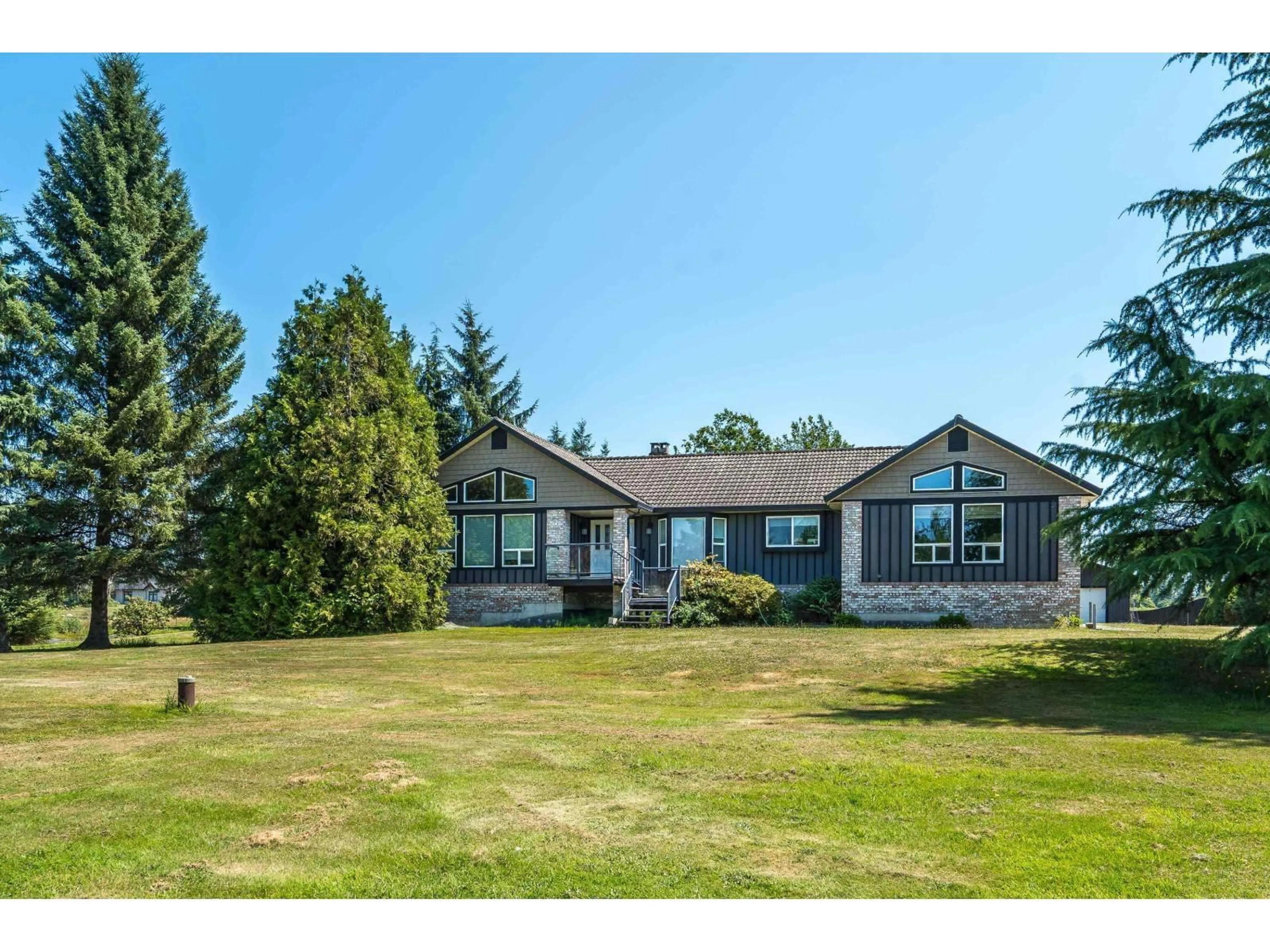 A pic from outside/outdoor area/front of a property/back of a property/a pic from drone, water/lake/river/ocean view for 7094 267 STREET, Langley British Columbia V4W1W2