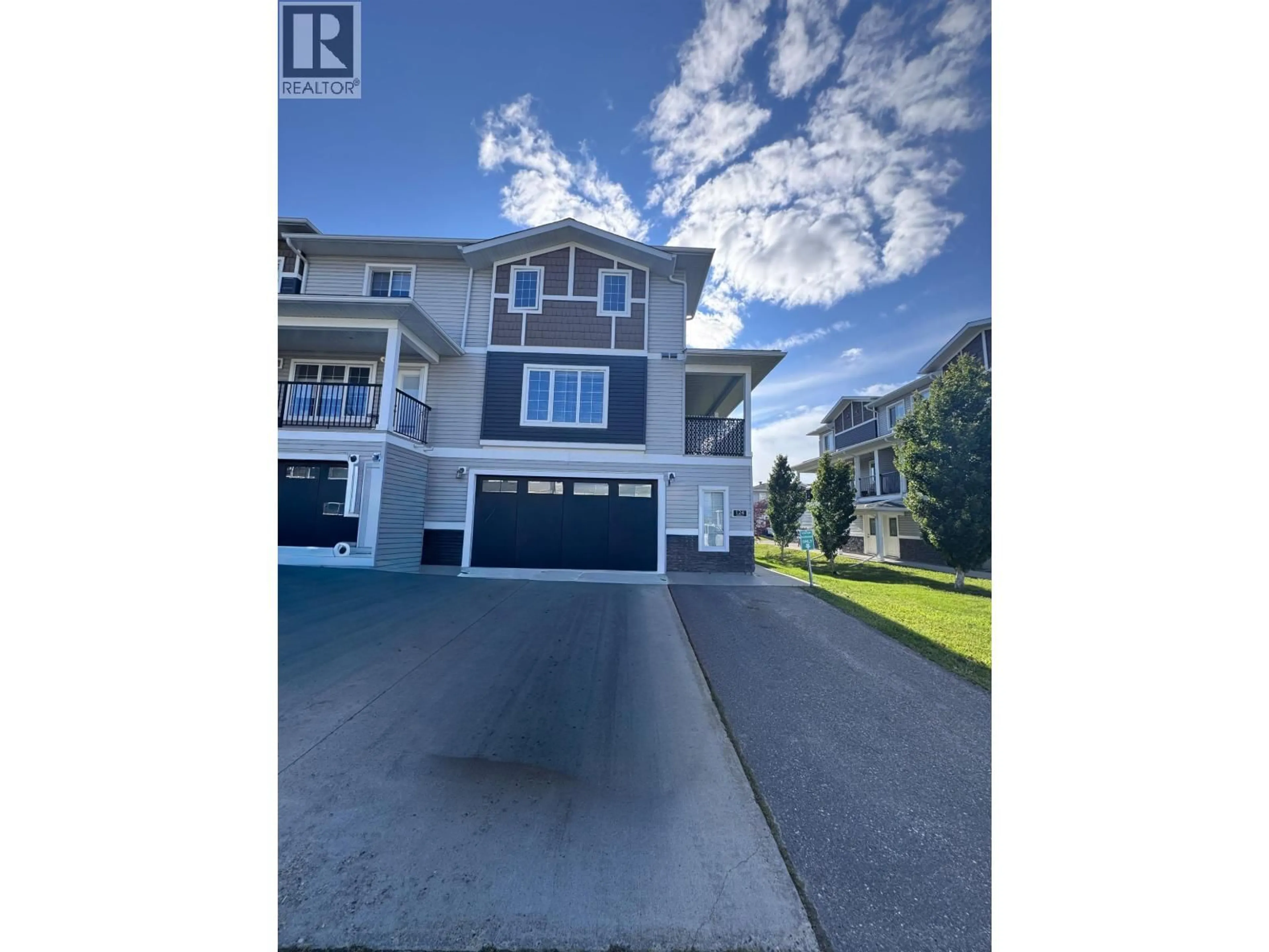 A pic from outside/outdoor area/front of a property/back of a property/a pic from drone, water/lake/river/ocean view for 124 - 10104 114A AVENUE, Fort St. John British Columbia V1J0K5