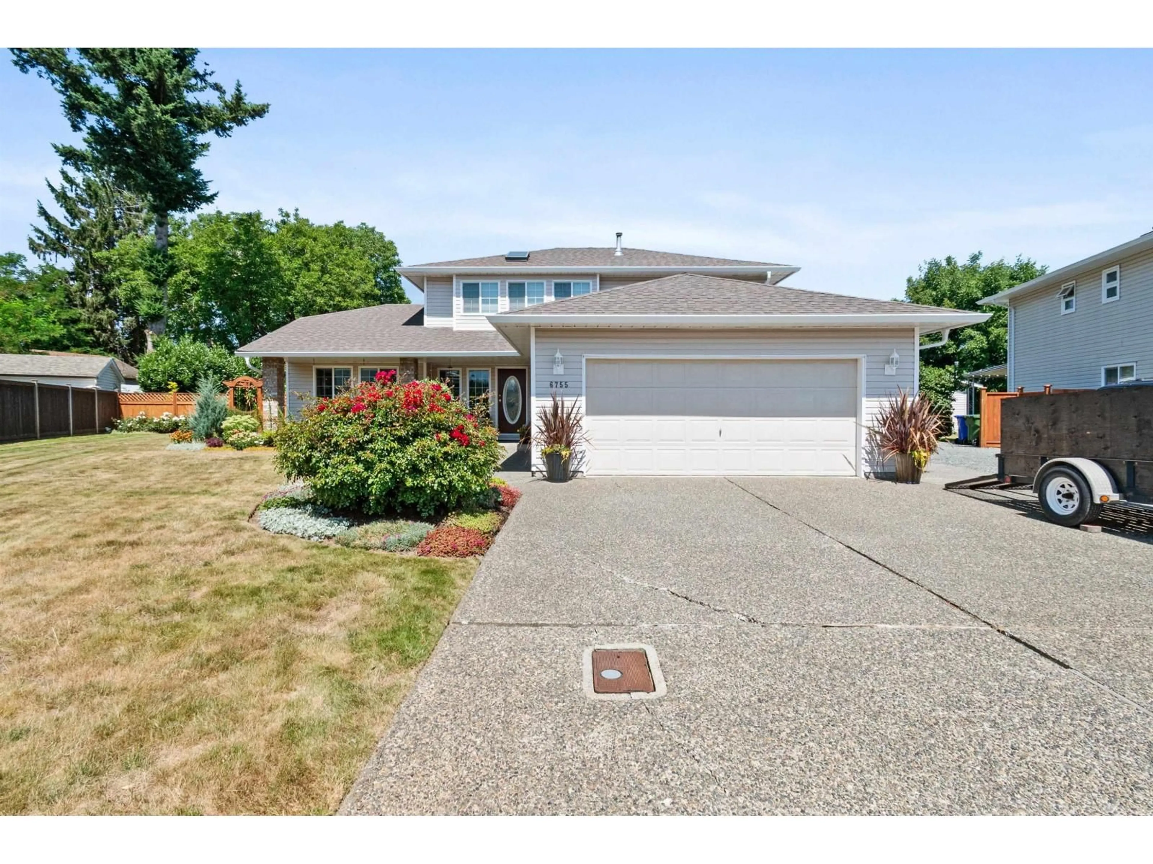 Home with vinyl exterior material, street for 6755 HENRY STREET, Chilliwack British Columbia V2R2Z9