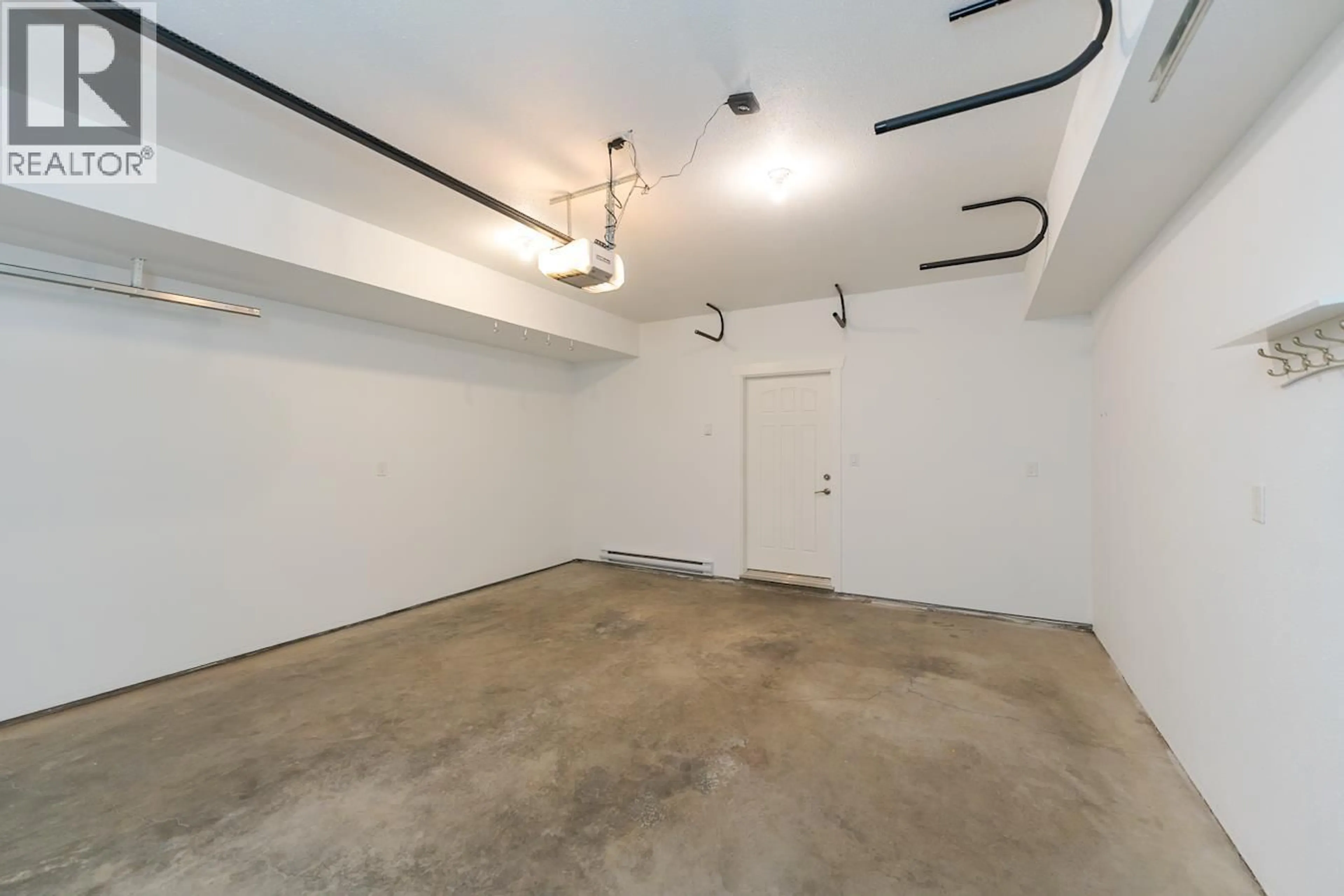 Indoor garage for 106 - 1699 7TH AVENUE, Prince George British Columbia V2L0C1