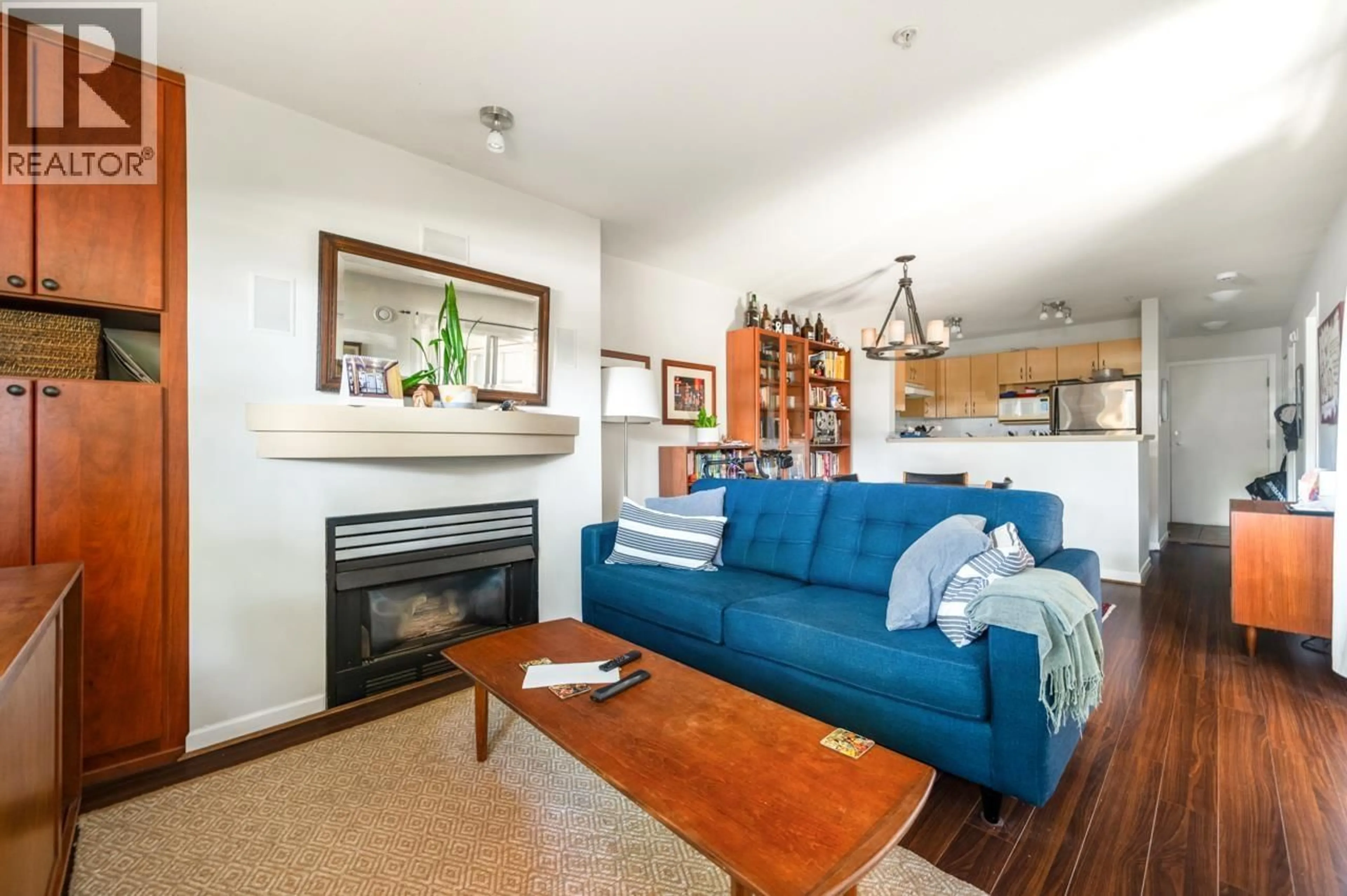 Living room with furniture, wood/laminate floor for 106 - 2983 4TH AVENUE, Vancouver British Columbia V6K1R5