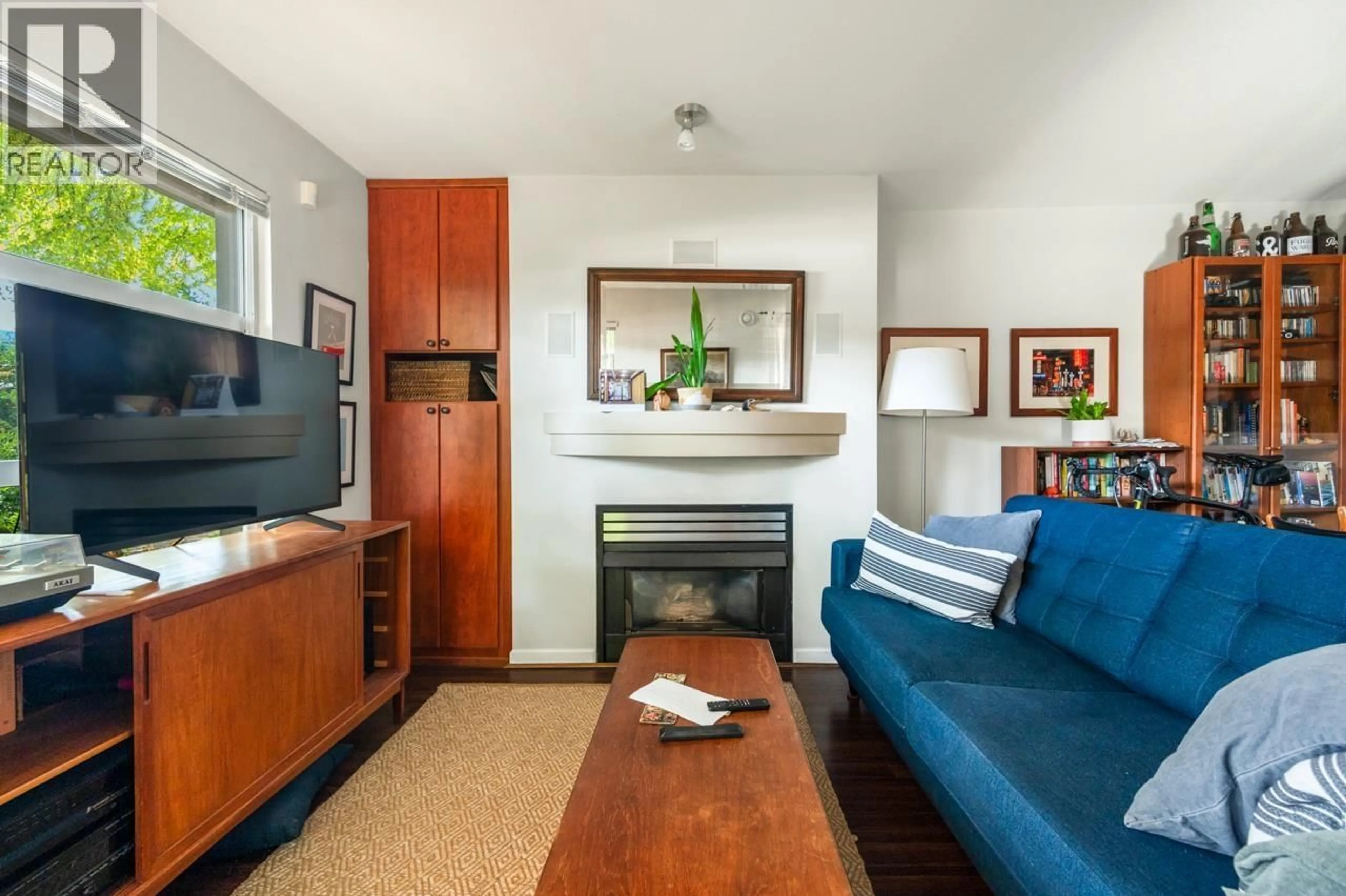 Living room with furniture, wood/laminate floor for 106 - 2983 4TH AVENUE, Vancouver British Columbia V6K1R5