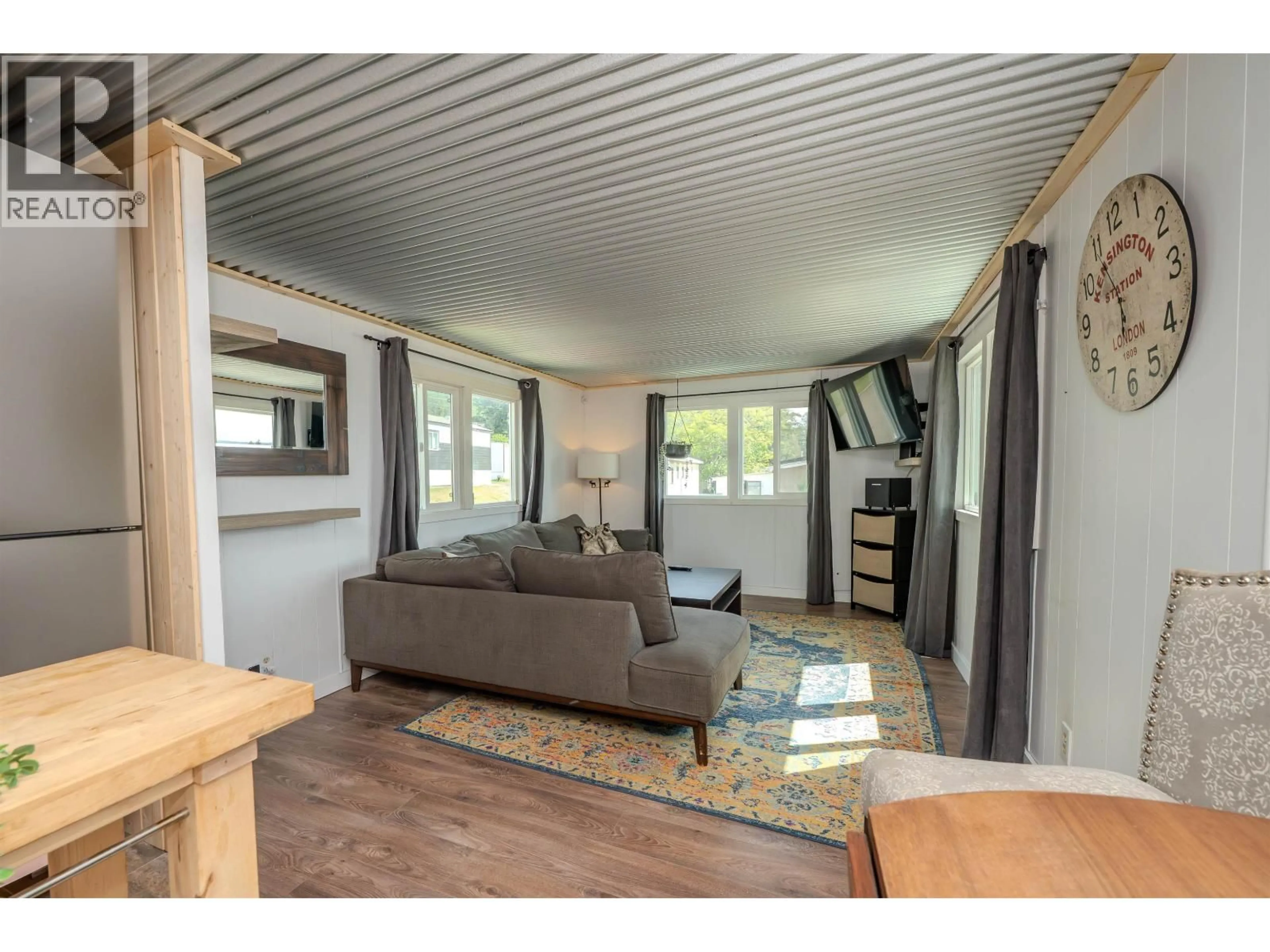 Living room with furniture, wood/laminate floor for 29 - 770 11TH AVENUE, Williams Lake British Columbia V2G2M4