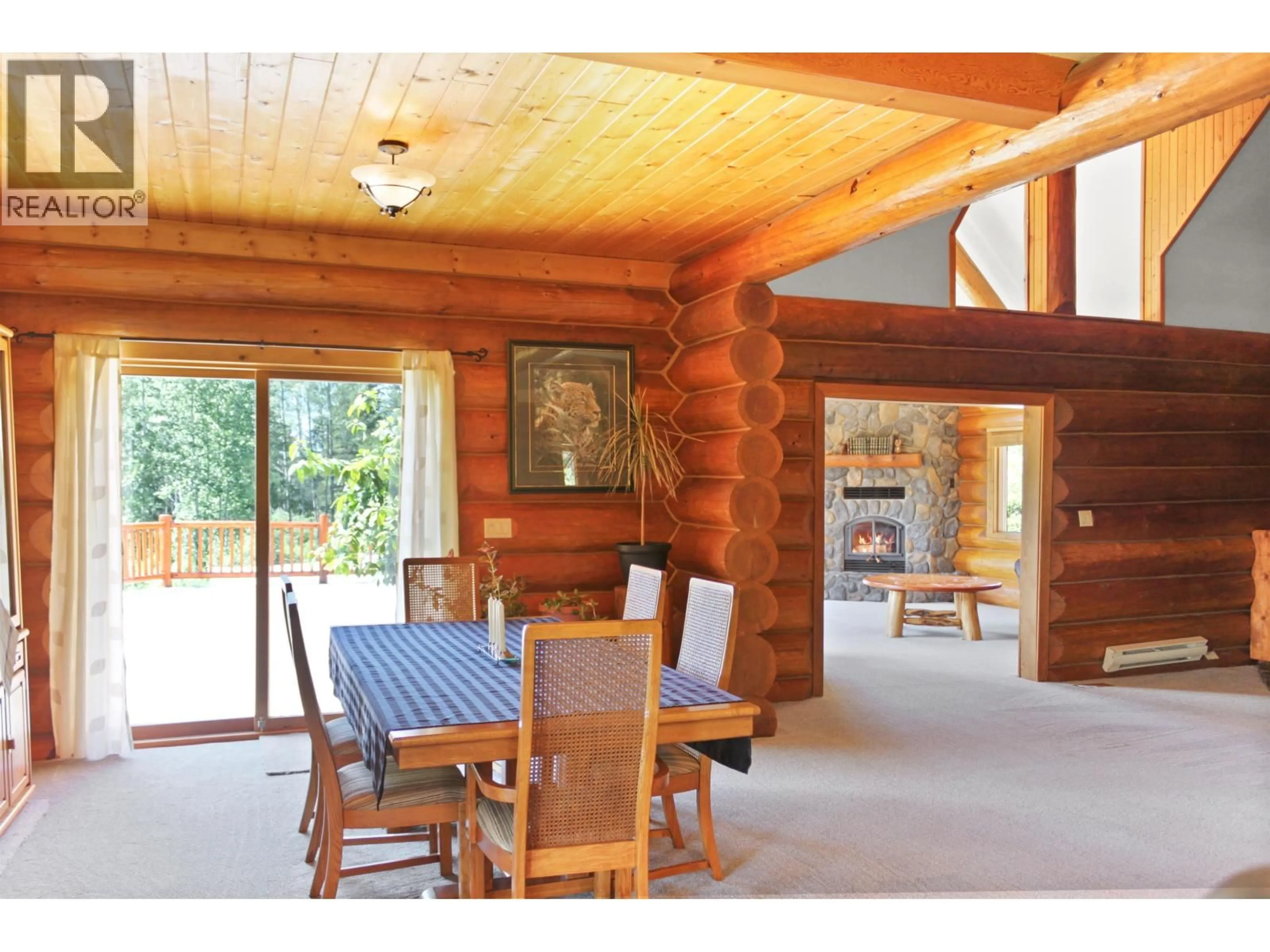 Dining room, wood/laminate floor for 7134 GROSSETT ROAD, Bridge Lake British Columbia V0K1X2