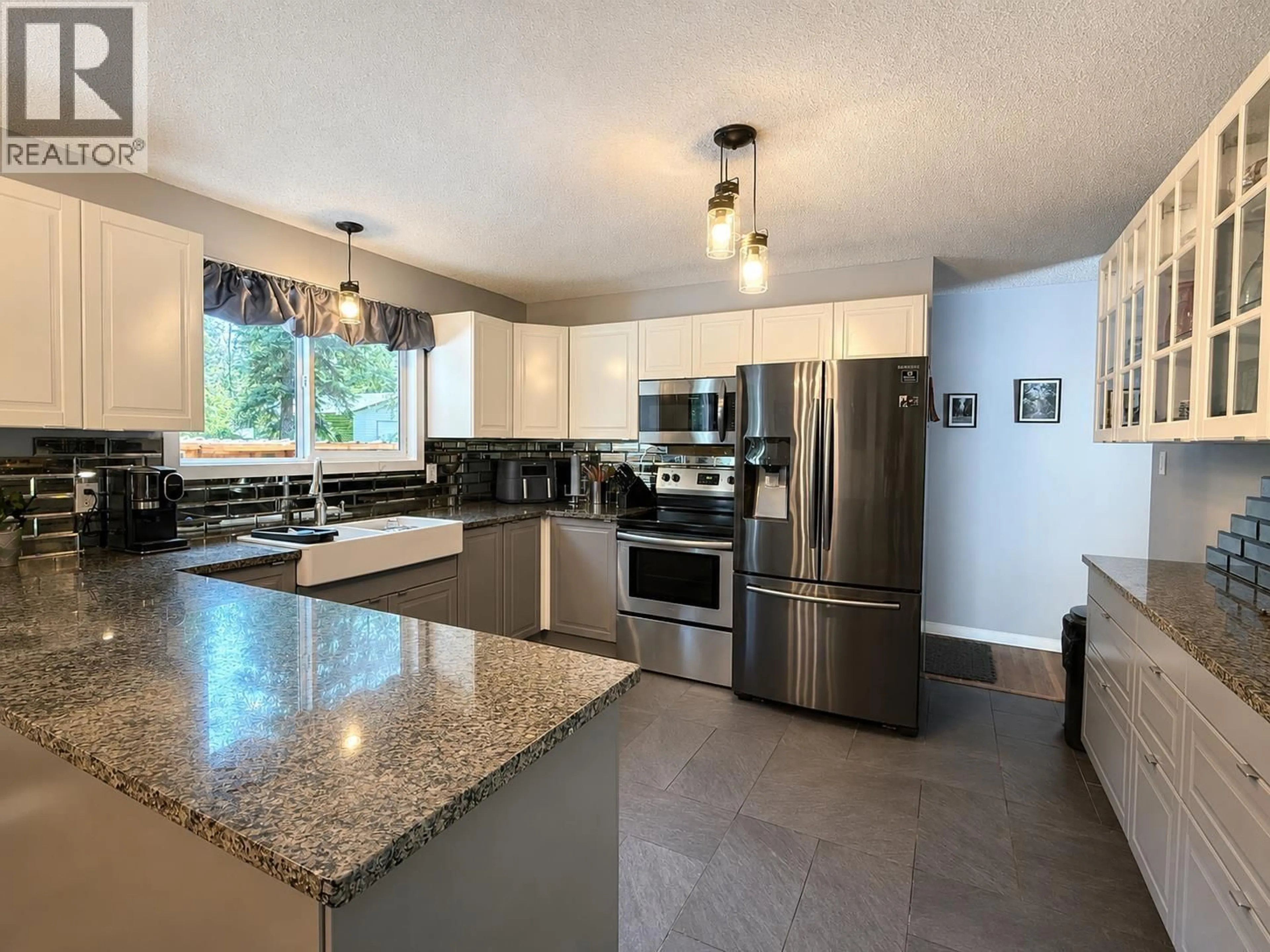 Open concept kitchen, ceramic/tile floor for 3945 GILBERT DRIVE, Prince George British Columbia V2K4Z6