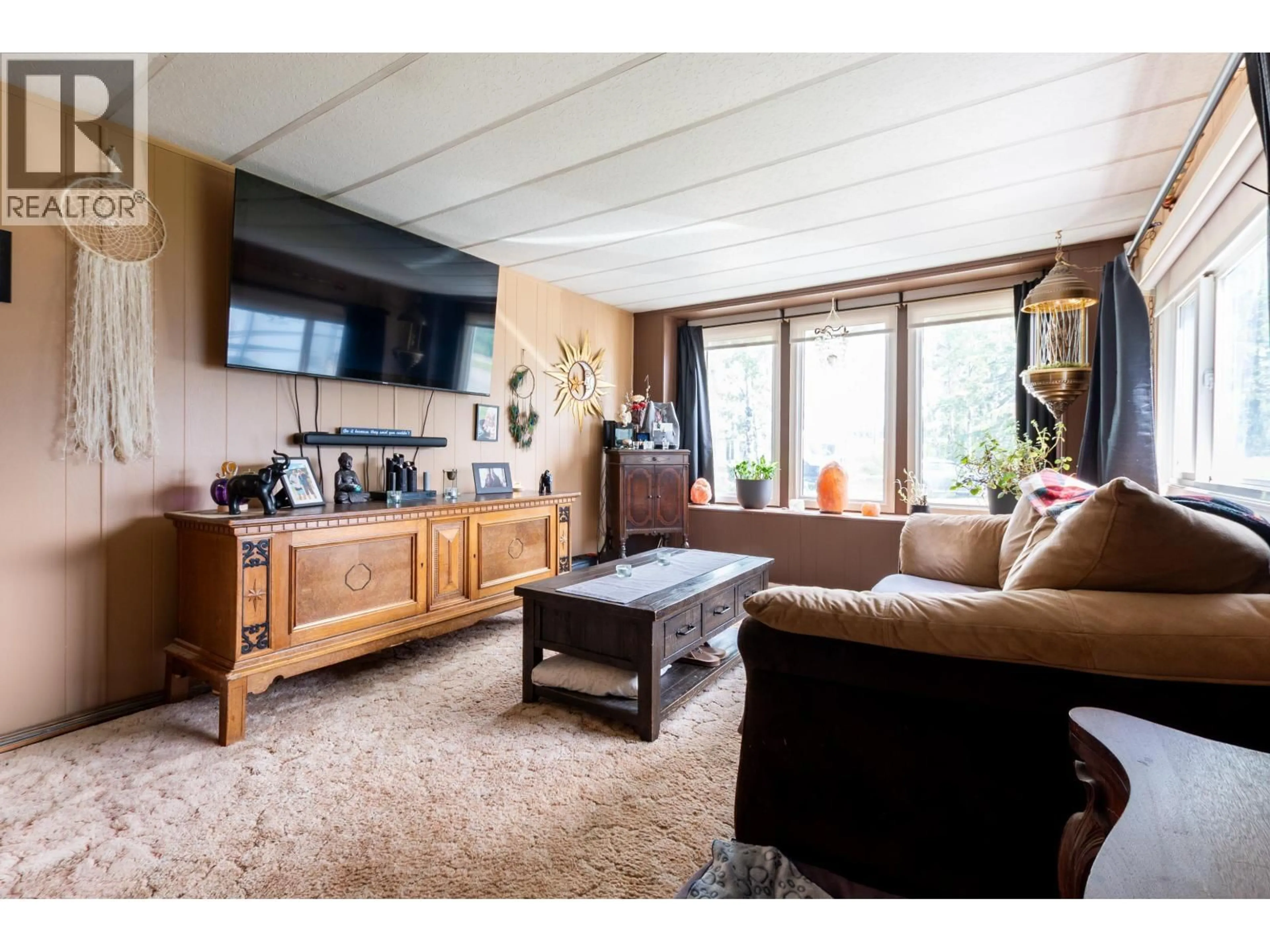 Living room with furniture, wood/laminate floor for 25 - 7817 HIGHWAY 97 HIGHWAY, Prince George British Columbia V2N6P6