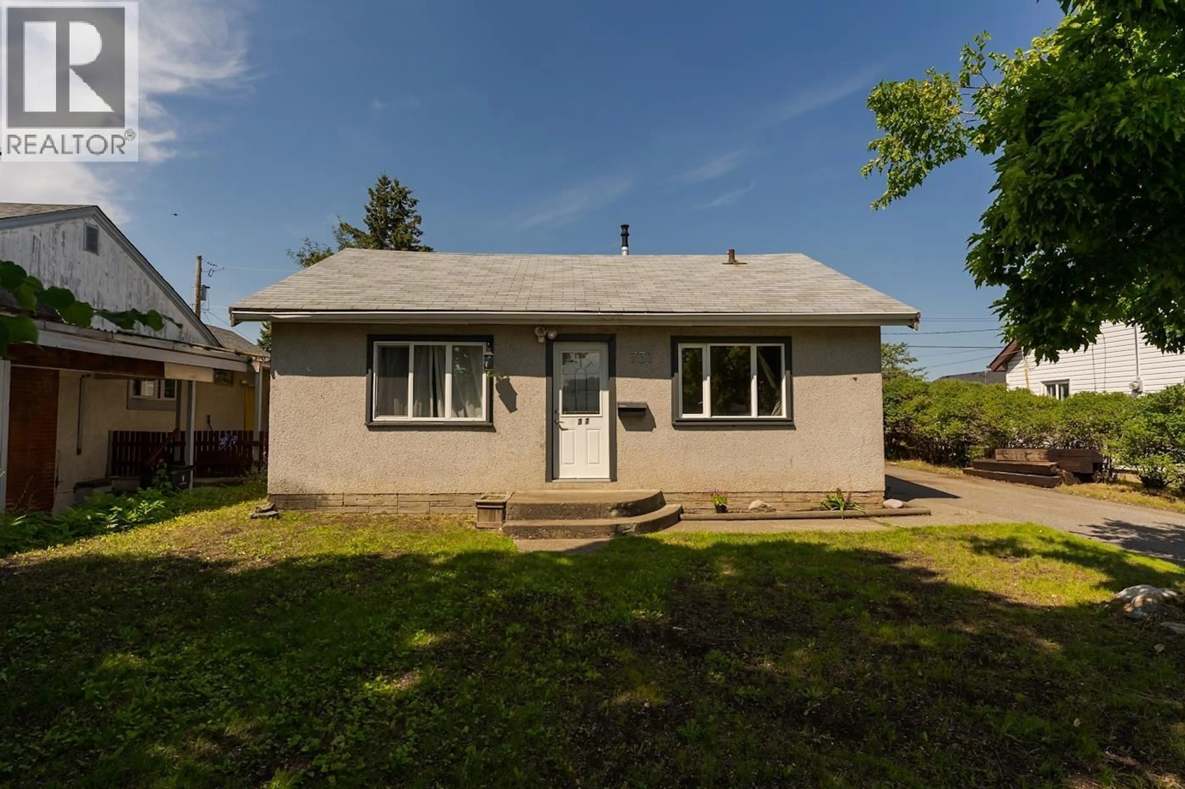 Home with vinyl exterior material, street for 737 IRWIN STREET, Prince George British Columbia V2M2X6