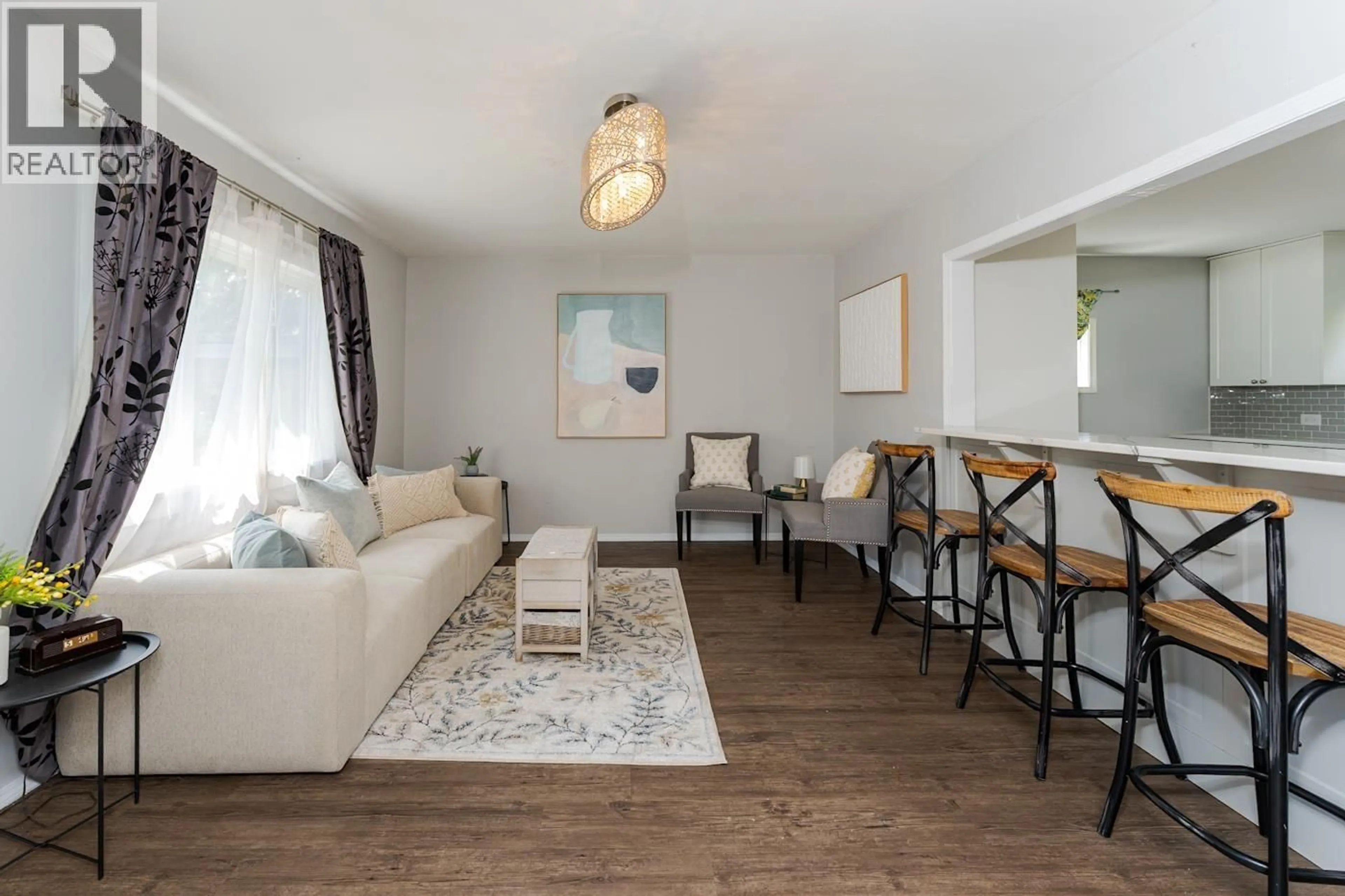 Living room with furniture, wood/laminate floor for 737 IRWIN STREET, Prince George British Columbia V2M2X6