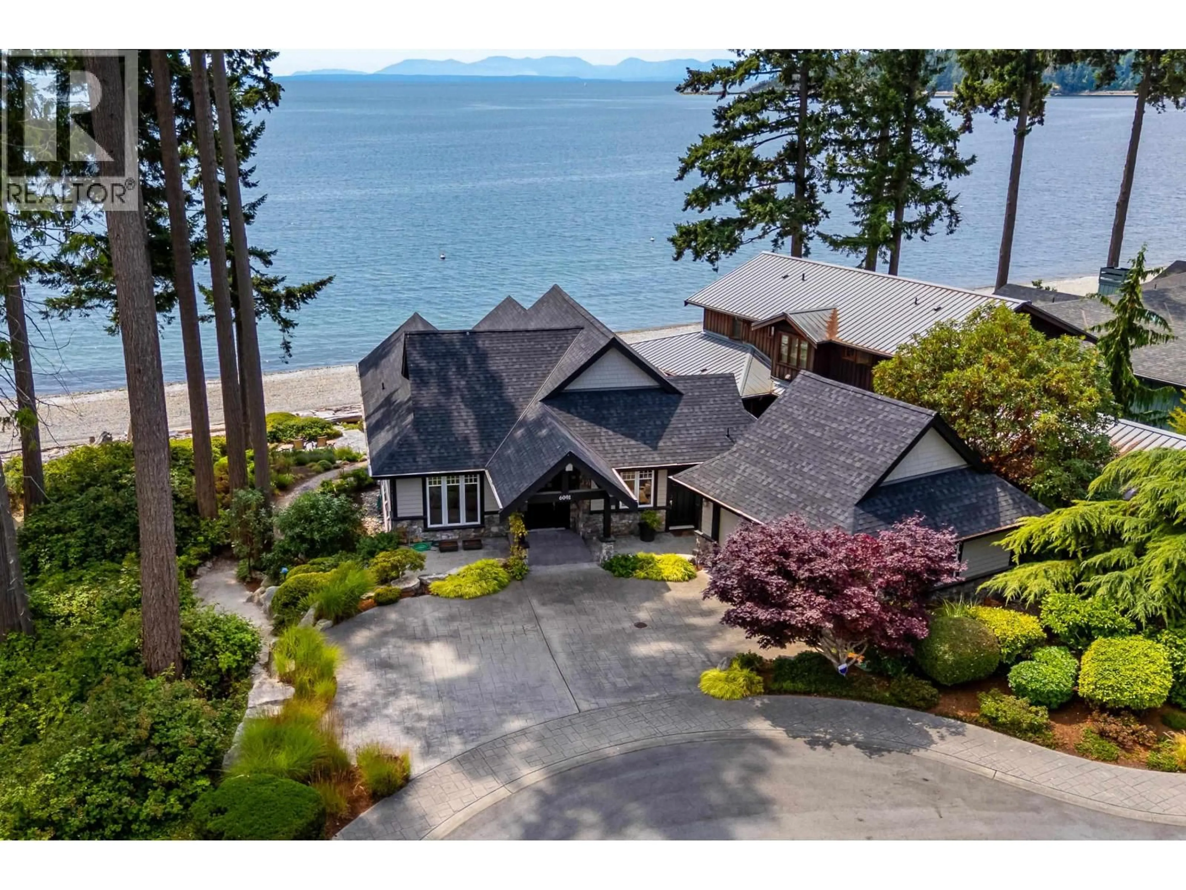 A pic from outside/outdoor area/front of a property/back of a property/a pic from drone, water/lake/river/ocean view for 6001 SILVERSTONE LANE, Sechelt British Columbia V7Z0T8