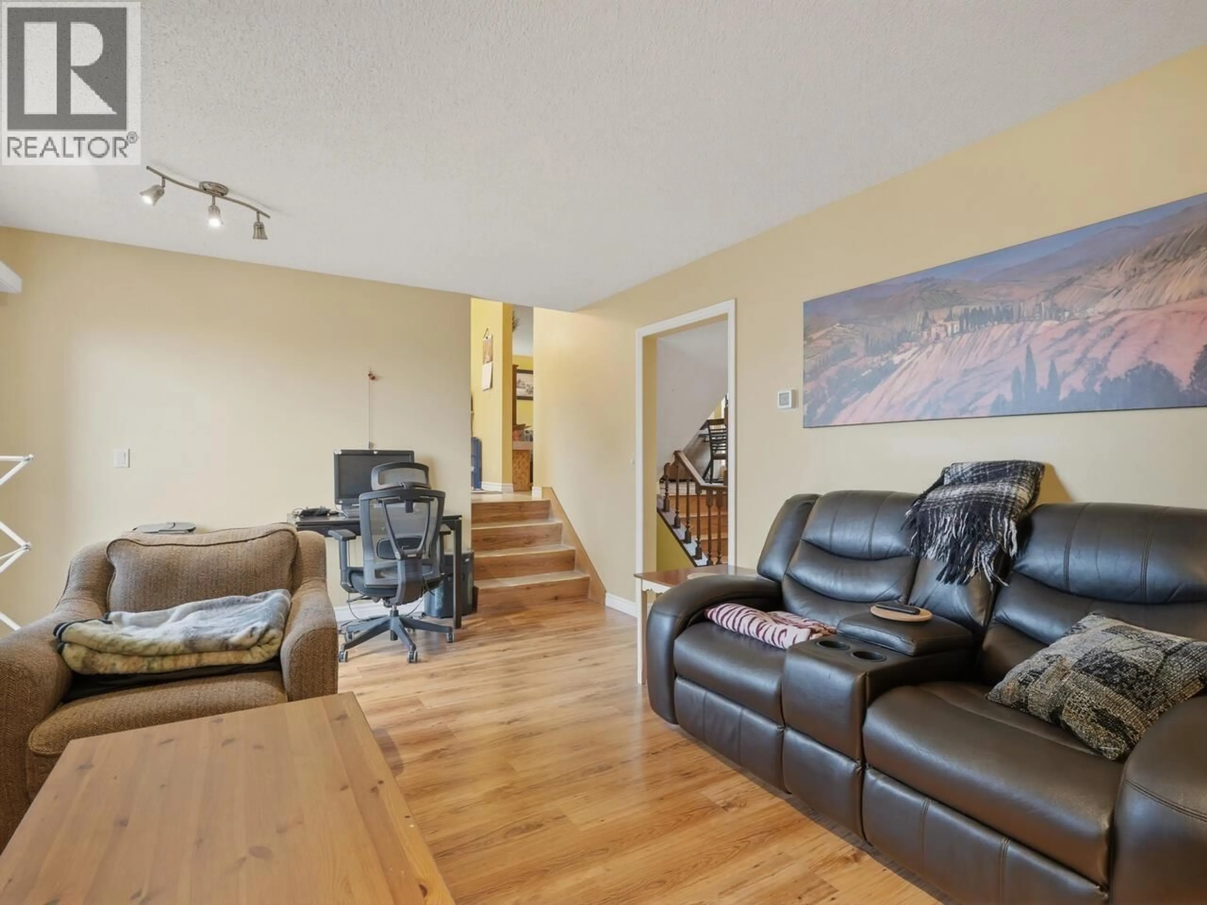 Living room with furniture, wood/laminate floor for 3183 BEACON DRIVE, Coquitlam British Columbia V3C3W7