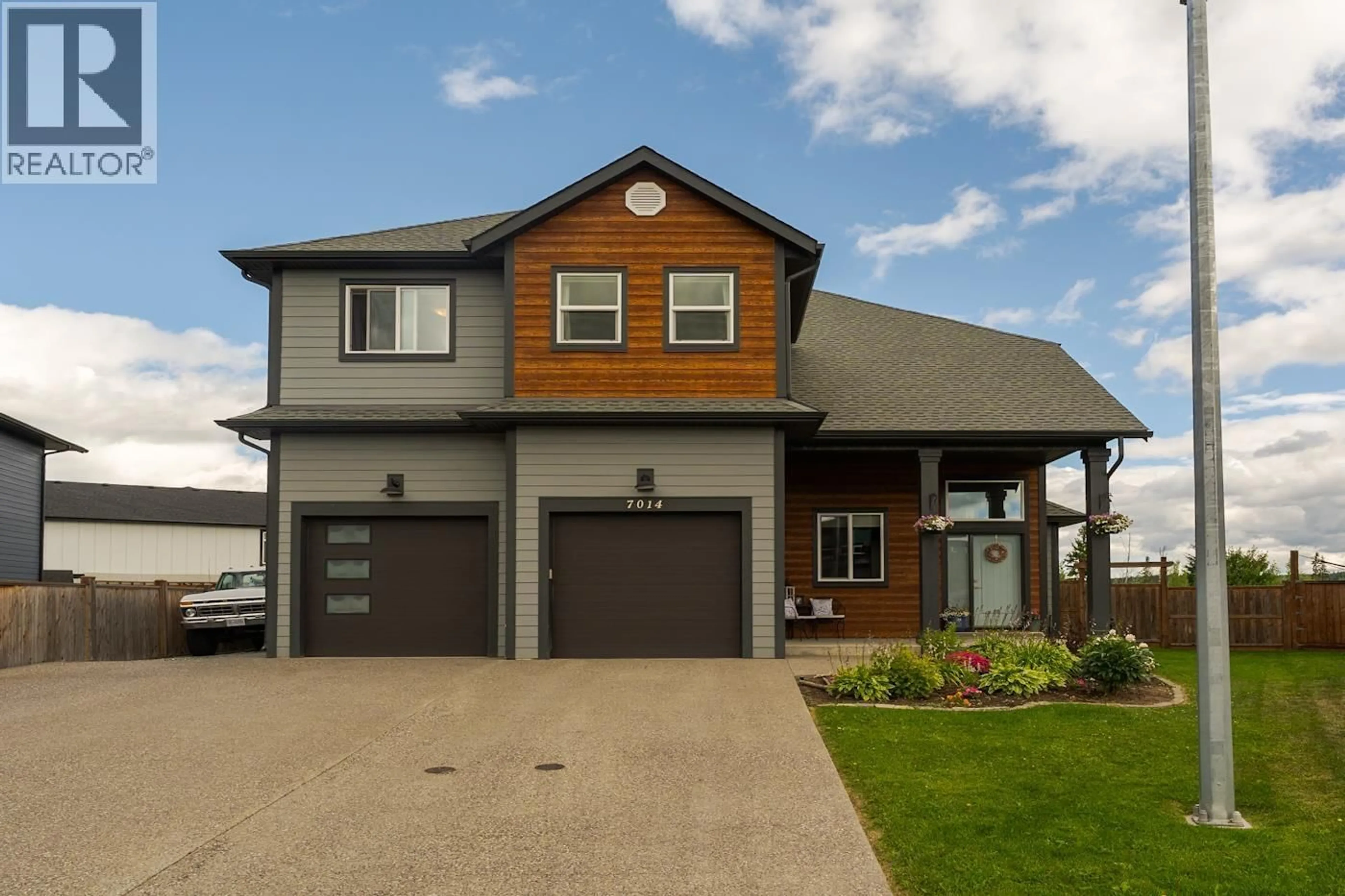 Home with vinyl exterior material, street for 7014 STONECREEK PLACE, Prince George British Columbia V2N0H2