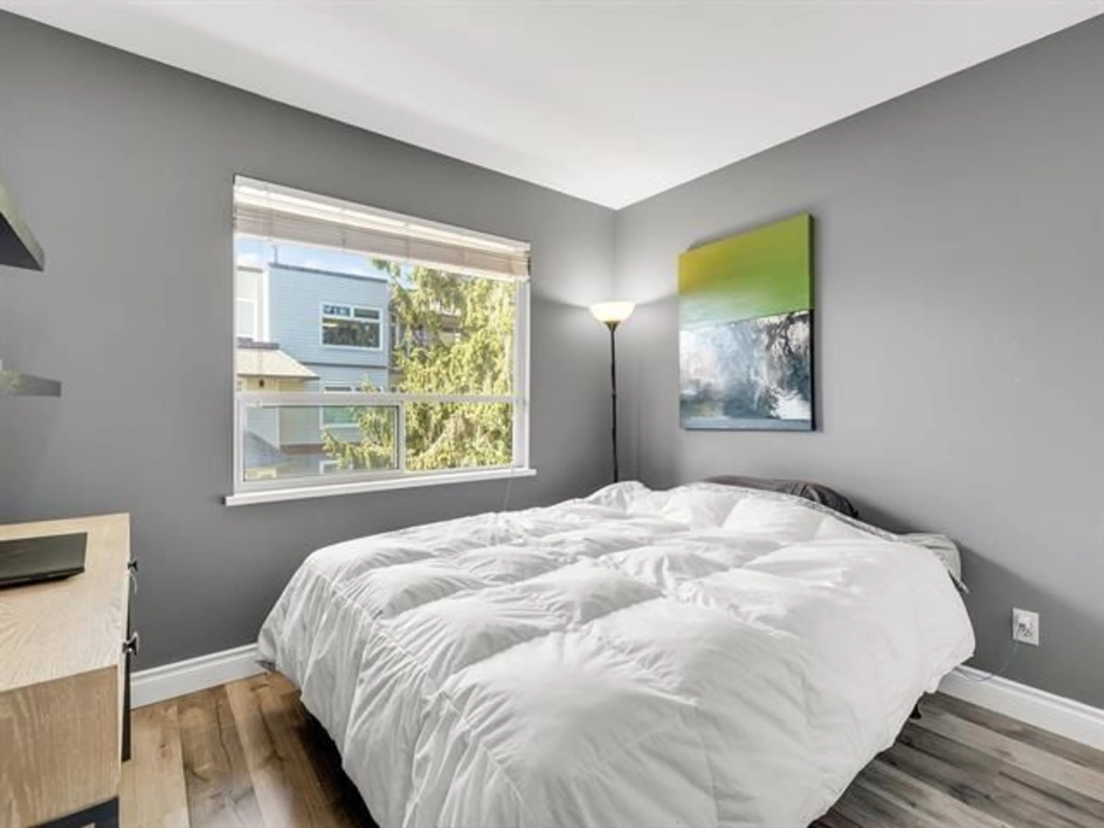 Bedroom with bed, wood/laminate floor for 101 - 1225 MERKLIN STREET, White Rock British Columbia V4B4B8