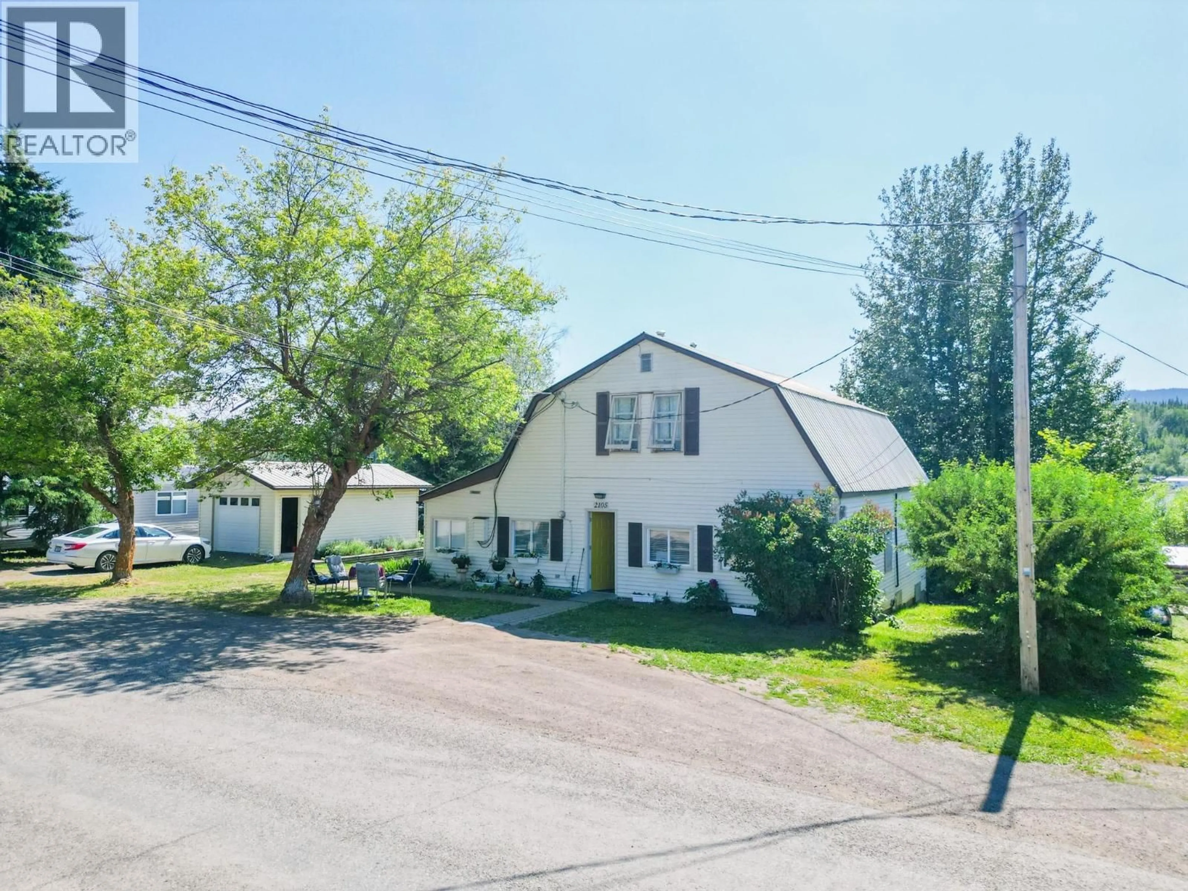 A pic from outside/outdoor area/front of a property/back of a property/a pic from drone, street for 2105 GEROW ISLAND ROAD, Burns Lake British Columbia V0J1E2