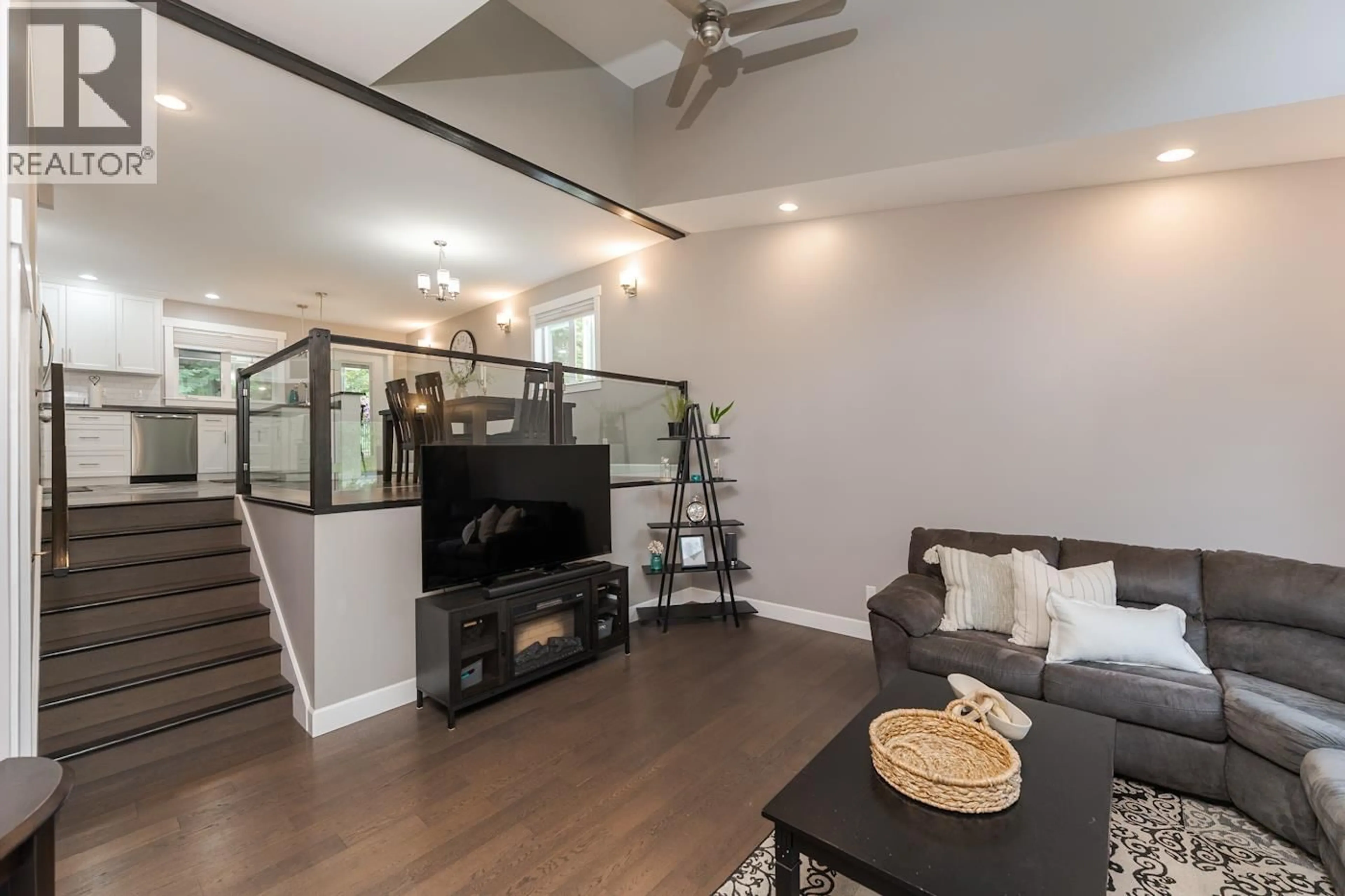 Living room with furniture, wood/laminate floor for 4061 ESTAVILLA DRIVE, Prince George British Columbia V2K2T8