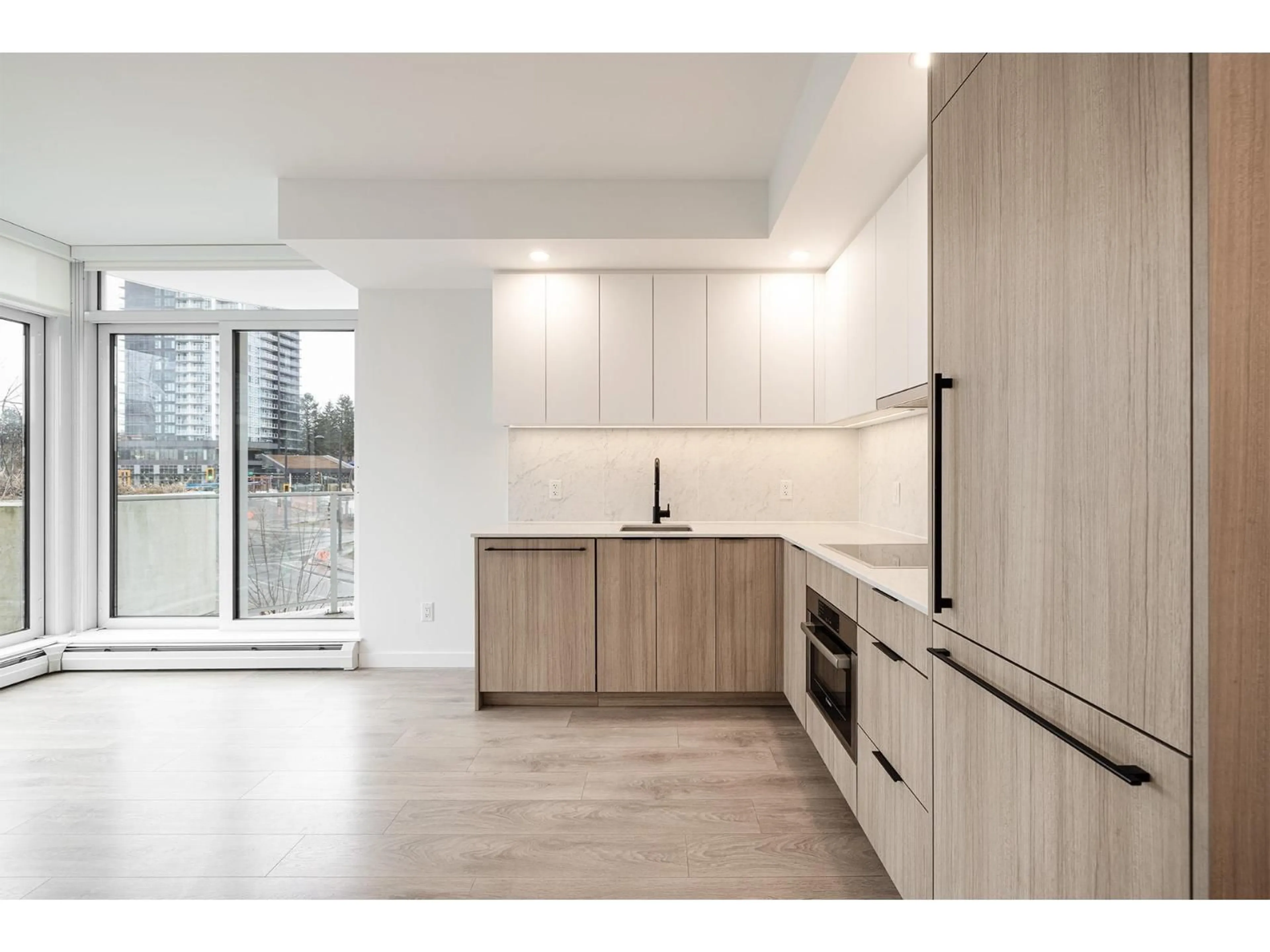 Open concept kitchen, unknown for 202 - 13685 102 AVENUE, Surrey British Columbia V3T0S2