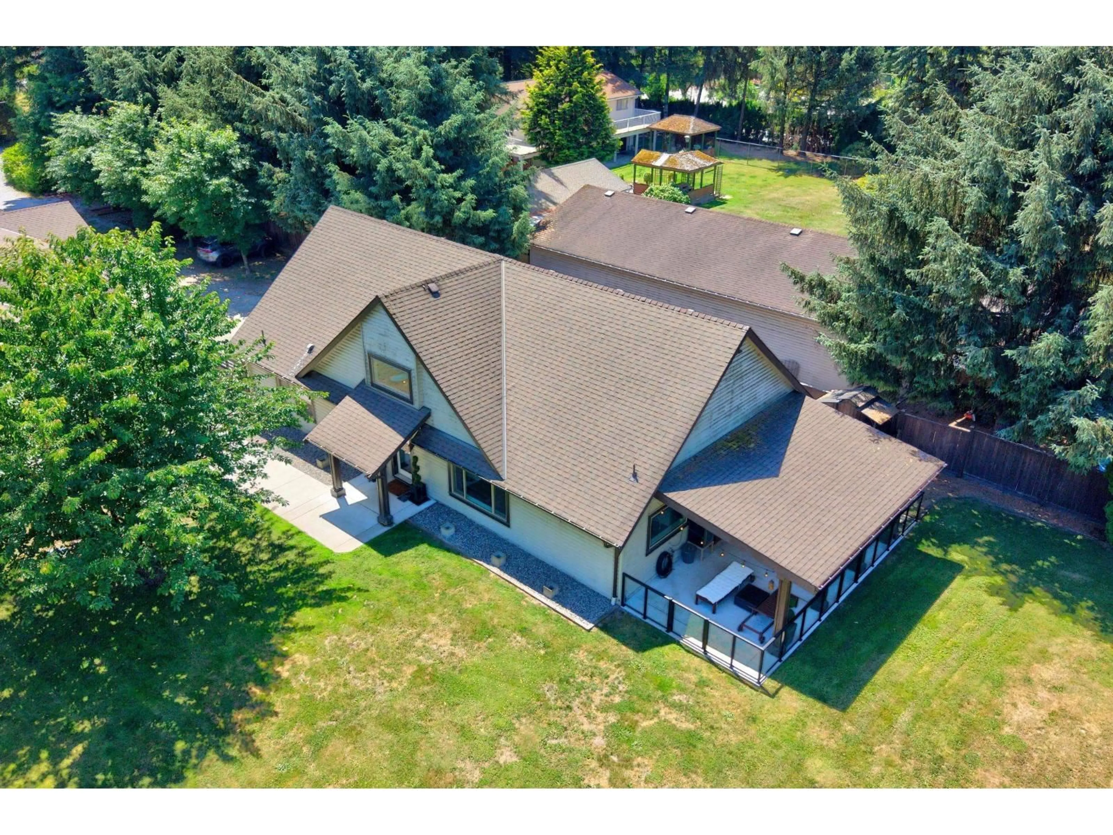 A pic from outside/outdoor area/front of a property/back of a property/a pic from drone, mountain view for 19185 90 AVENUE, Surrey British Columbia V4N3X2