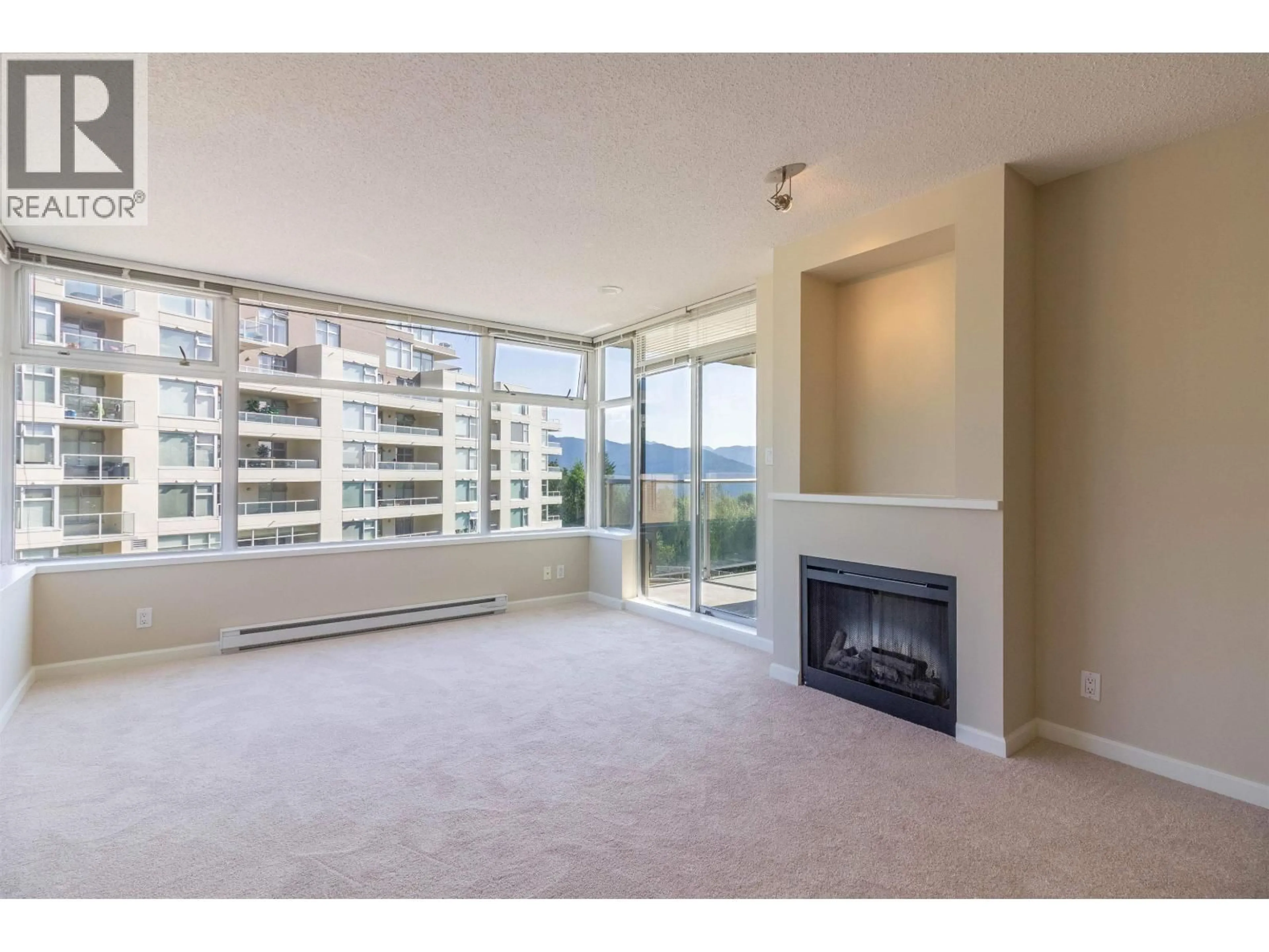 Living room with furniture, unknown for 303 - 9298 UNIVERSITY CRESCENT, Burnaby British Columbia V5A4X8